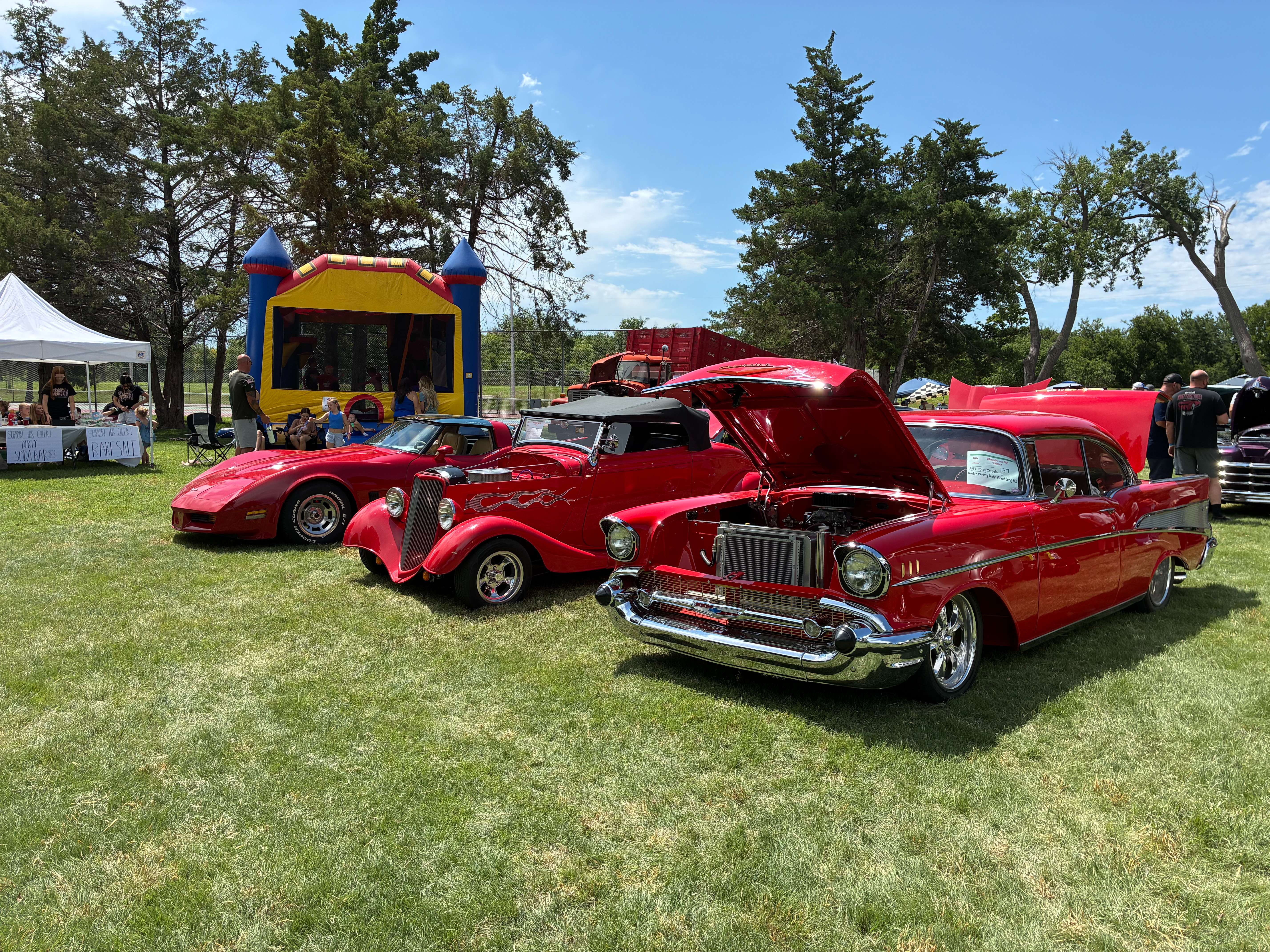 From left to right, a 1980 Chevy Corvette owned by Dennis Bittel, a 1933 Ford 40 Coupe owned by Rick Dechant and a 1957 Chevy Impala owned by Randy and Christy Suchy. Photo by Alin Hett/Hays Post