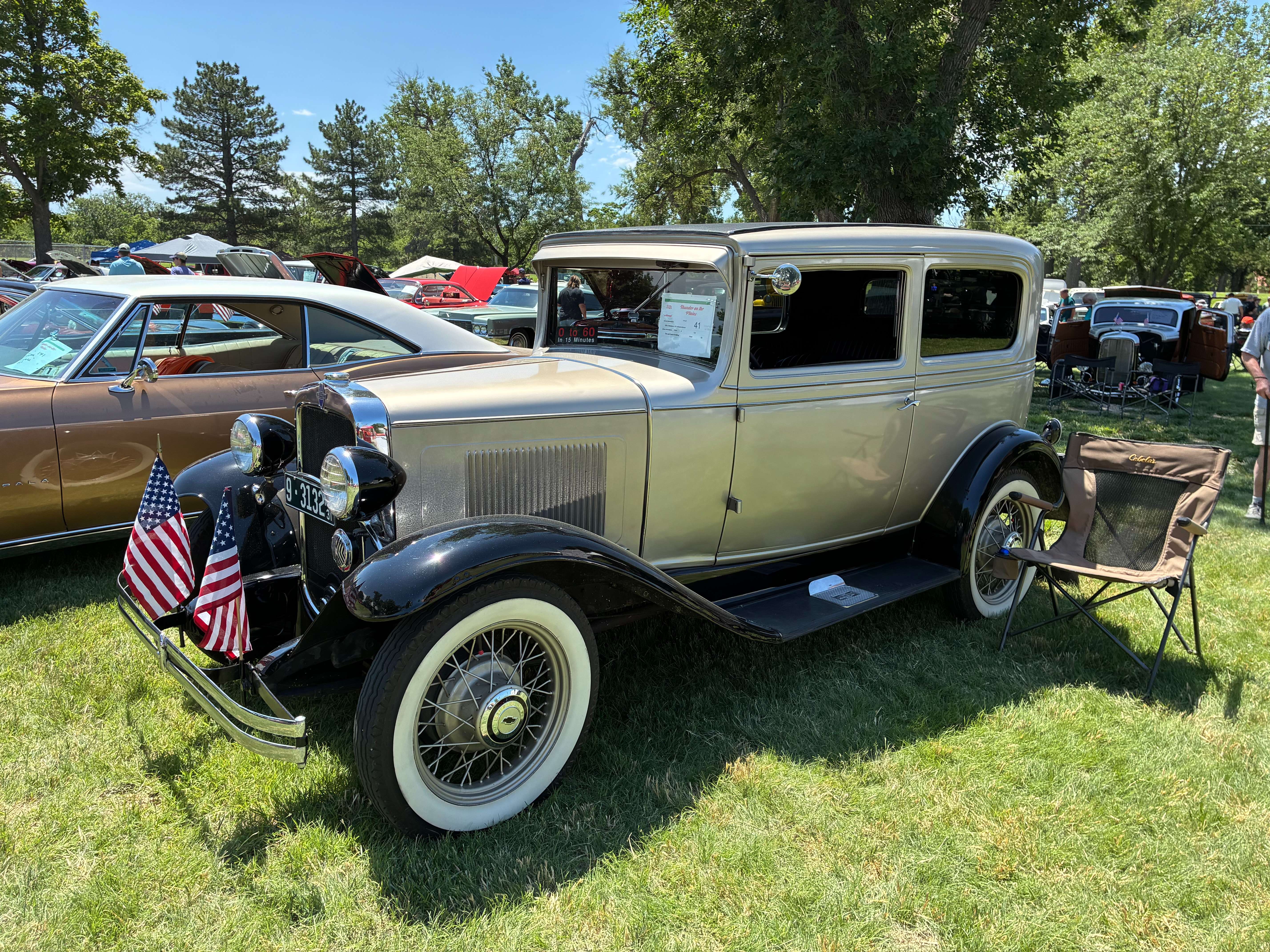 One of the oldest vehicles on display featuring a 1931 Chevy AE Independence with American flags at the front from owners Tim and Sarah Dreiling. Photo by Alin Hett/Hays Post