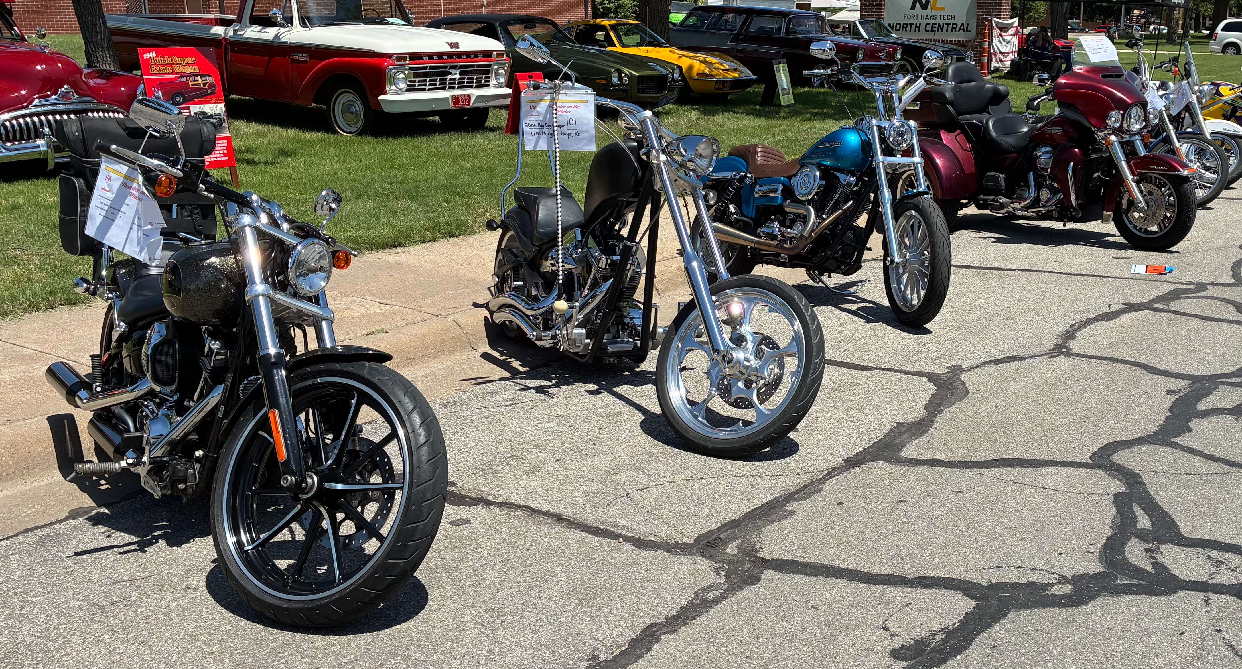 From left, a 2016 Harley Davidson Breakout from owner Alan Freidenberger, a 2006 Big Dog Chopper from owner Tim Morgan, a 2013 Harley Davidson Dyna Super Glide from owner Preston Renz and a 2017 Harley Davidson Tri-Glide from owner Leo Faulkner. Photo by Alin Hett/Hays Post