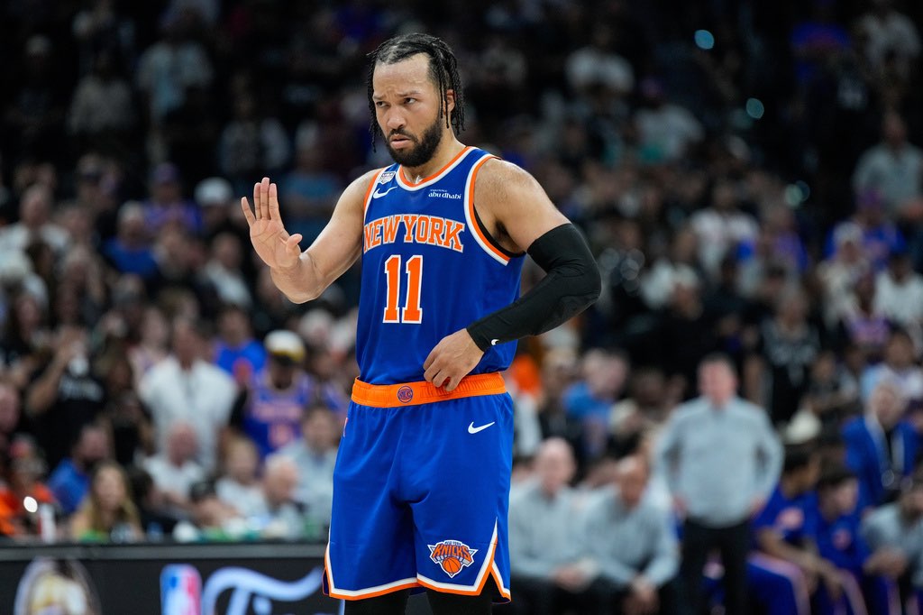 New York Knicks guard Jalen Brunson motions to teammates during the second half of Game 5 of the NBA Finals basketball series against the San Antonio Spurs, Saturday, June 13, 2026, in San Antonio. (AP Photo/Ross D. Franklin)
