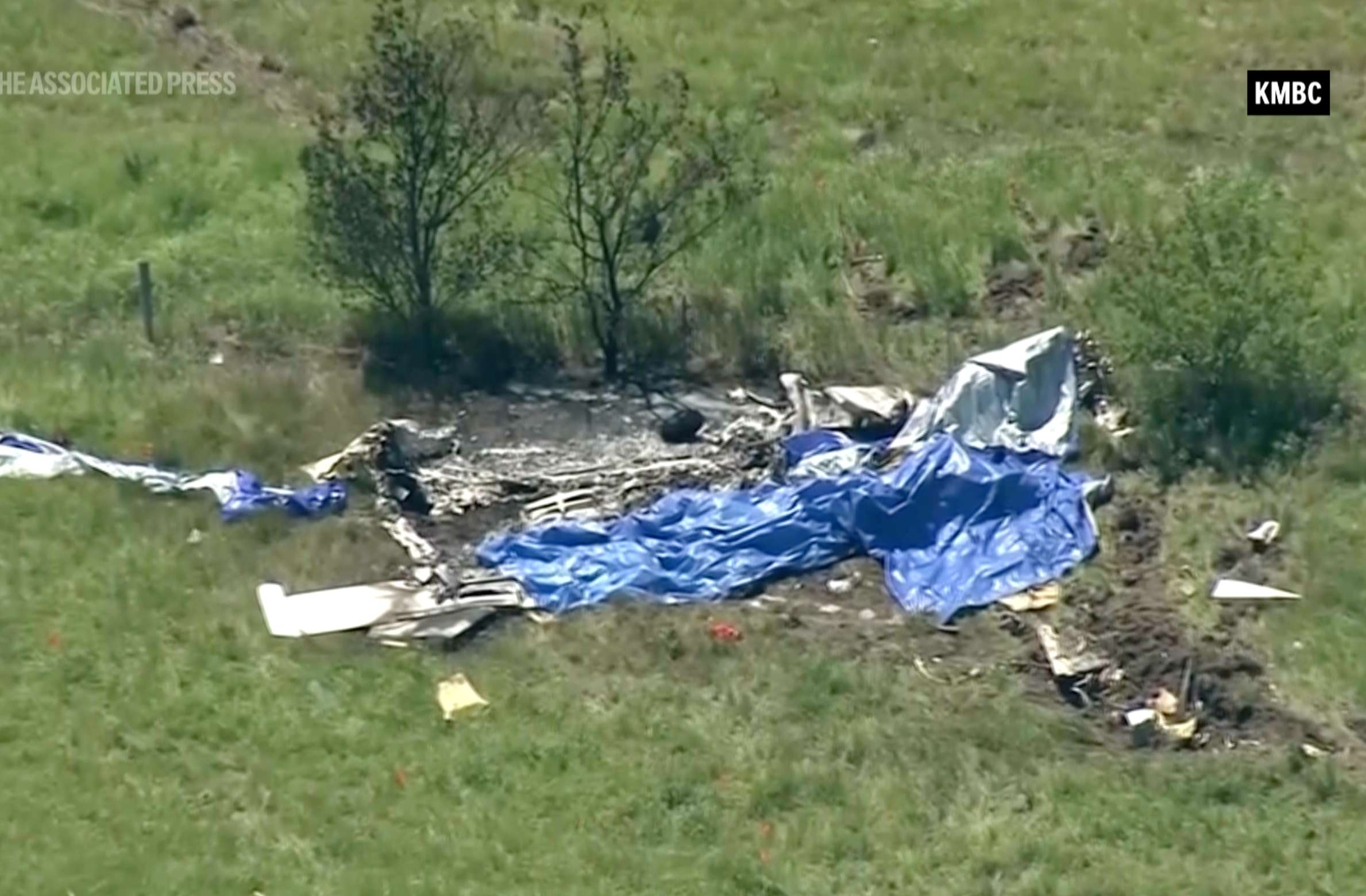 This video frame grab provided by KMBC-TV shows an aerial view of the crash scene near the Butler Memorial Airport in Butler, Mo., Sunday, June 14, 2026. (KMBC-TV via AP)