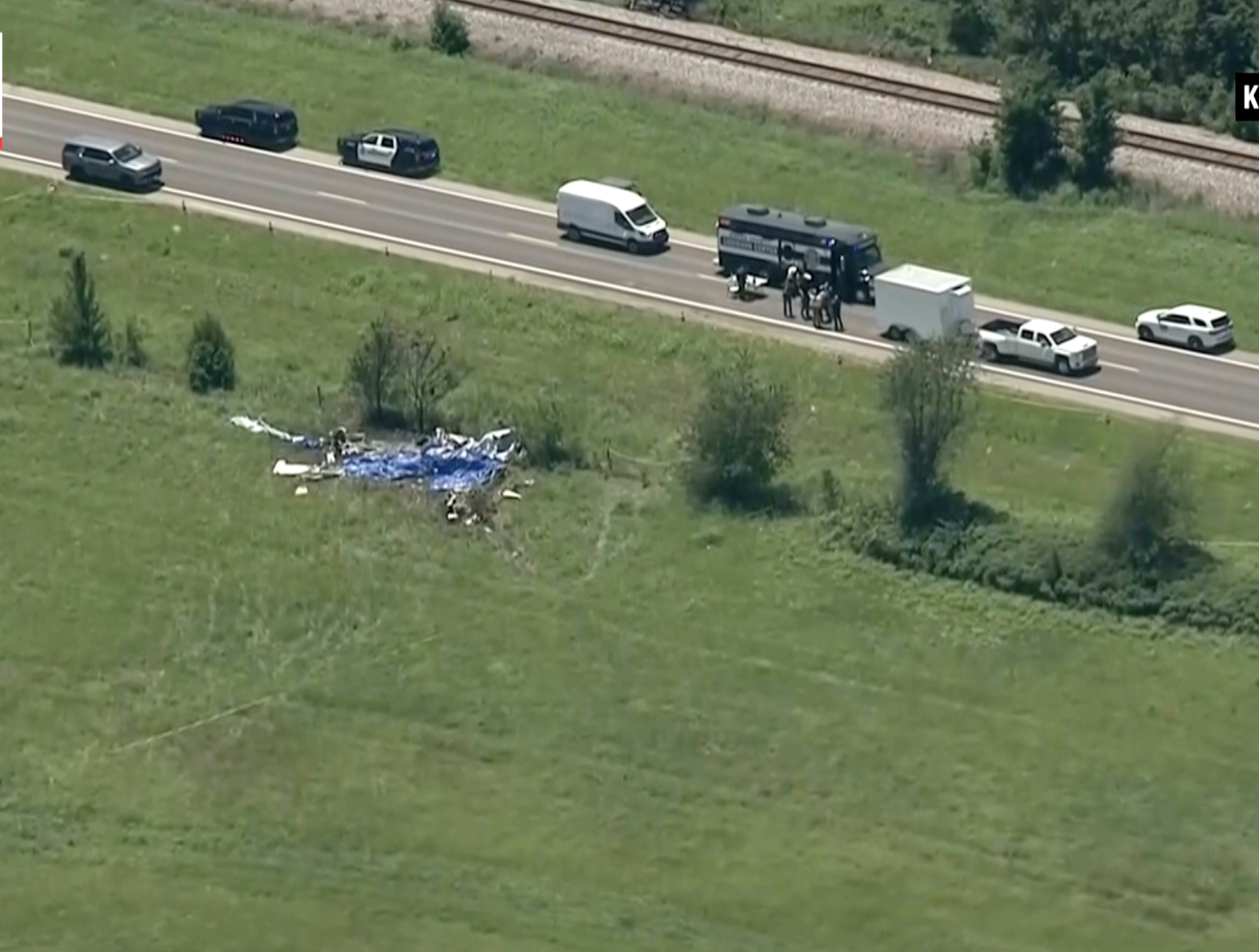 This video frame grab provided by KMBC-TV shows an aerial view of the crash scene near the Butler Memorial Airport in Butler, Mo., Sunday, June 14, 2026. (KMBC-TV via AP)