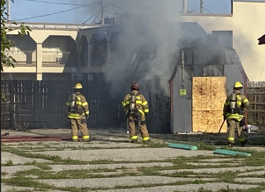 Hutchinson Fire Department battles a shed fire on June 15, 2026. (Hutch Post photo)