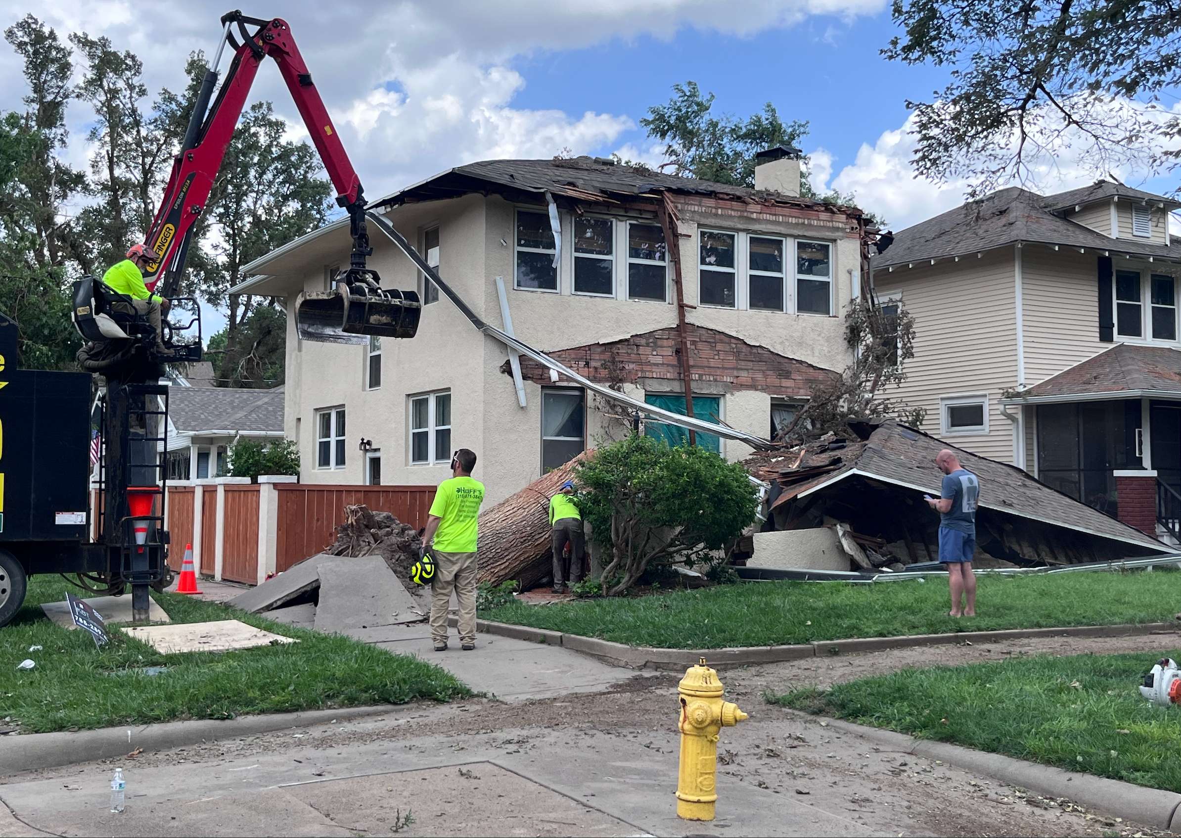 Tree collapses on house along Highland Avenue in Salina - Photo by Nicolas Fierro