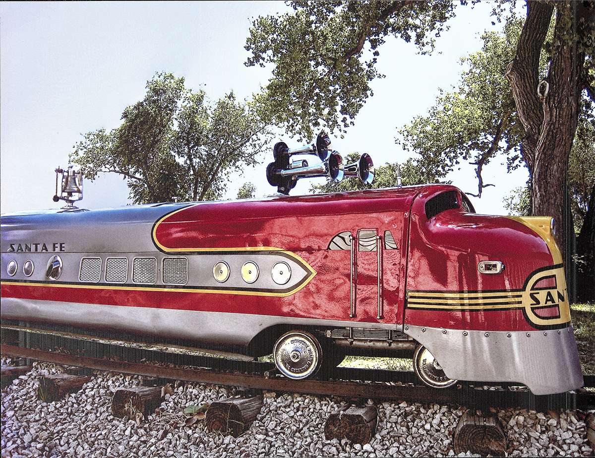 The G12 miniature train at the Barton County Historical Society once circled the oval track at Christmas Fantasy Village. An effort is underway to restore the train and have it running at the historical society.
