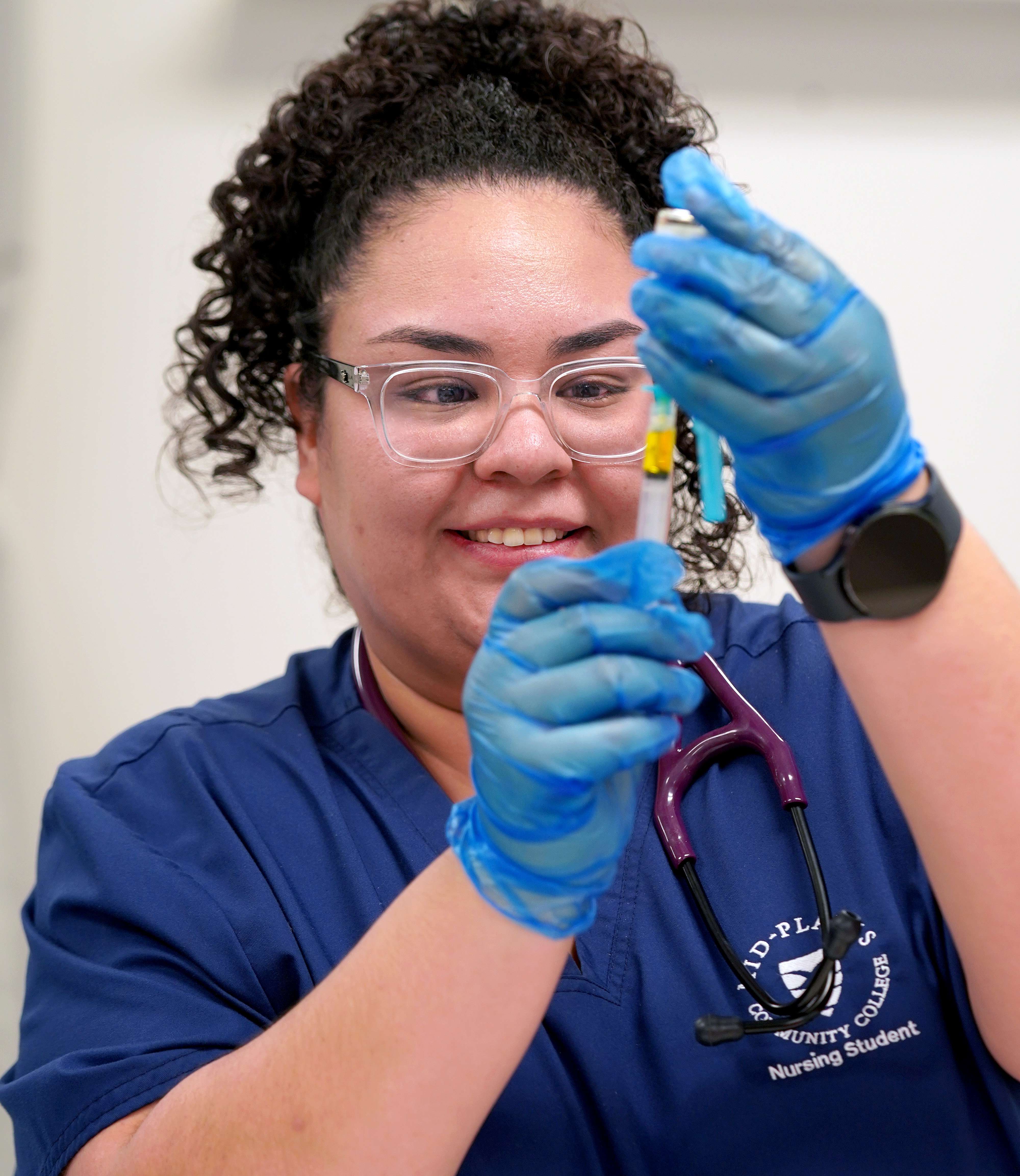 MPCC Nursing student Damaris Ramirez prepares a syringe at the Health and Science Center in North Platte. She and her classmates will be honored at the 2026 LPN graduation and pinning next Friday on South Campus. (MPCC)