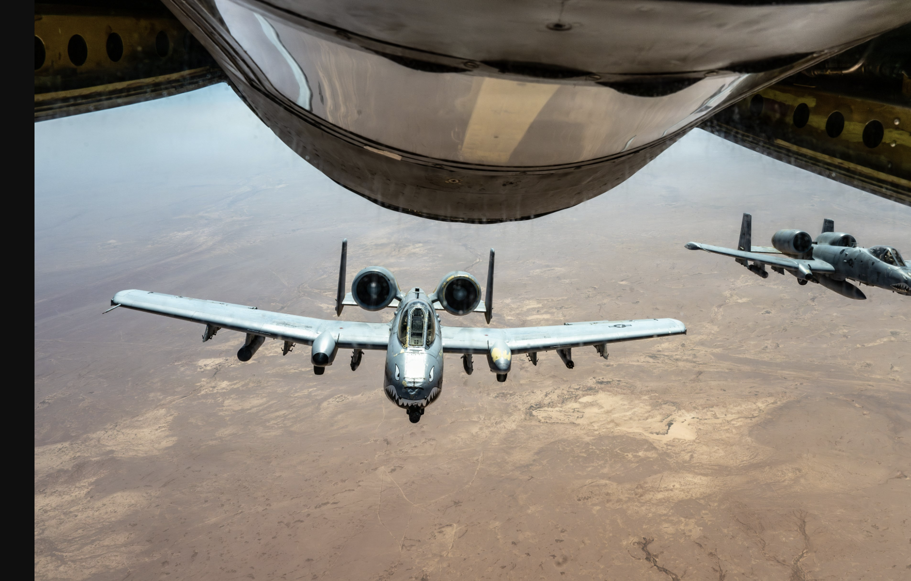 File photo -Two U.S. Air Force A-10 attack aircraft fly together over the Middle East during a routine patrol -U.S. Central Command