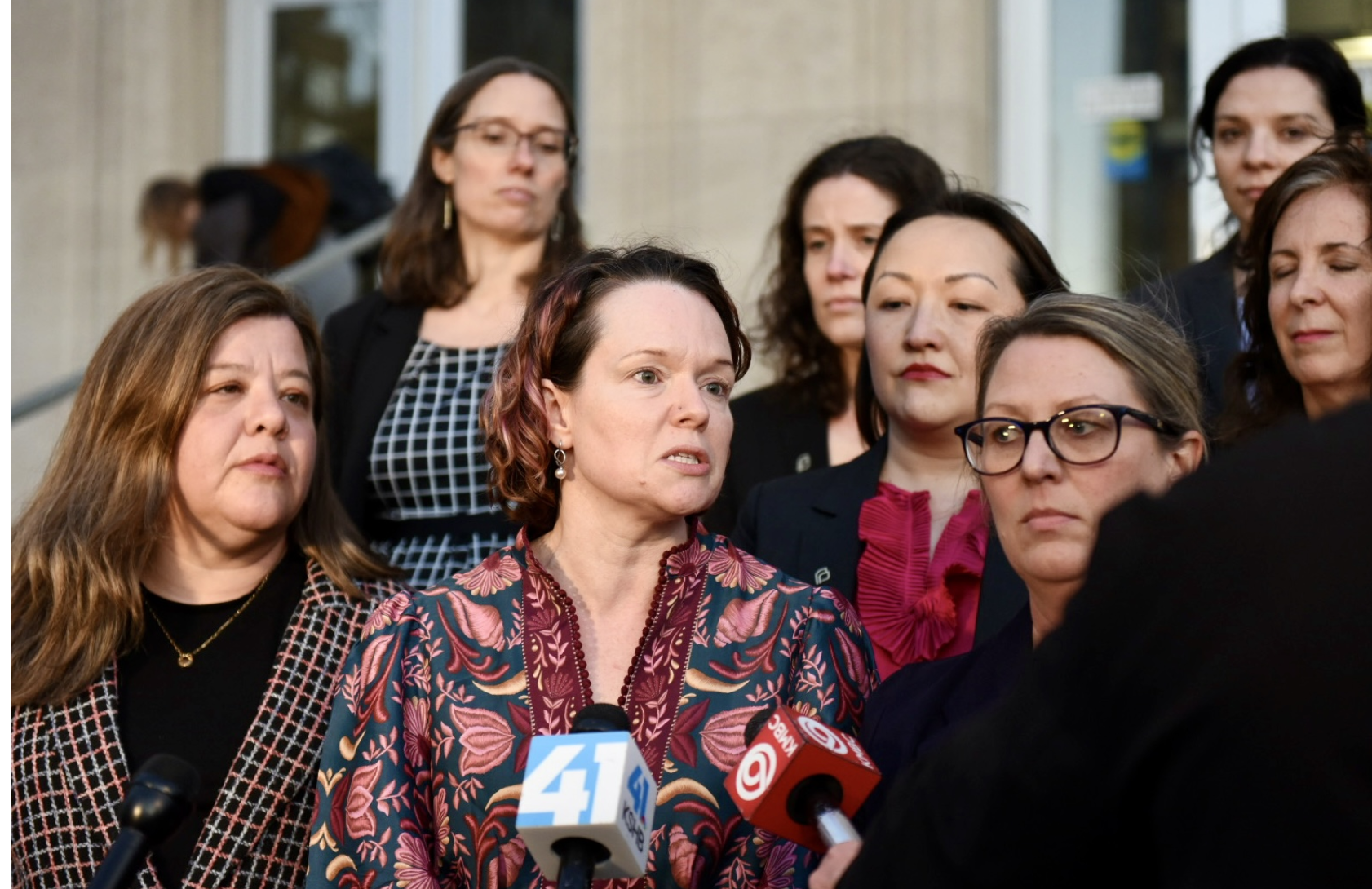 Dr. Margaret Baum (center), chief medical officer with Planned Parenthood Great Rivers, speaks to reporters following the opening day of a hearing litigating Missouri’s abortion regulations on Monday, Jan. 12, 2025, in front of the Jackson County courthouse in Kansas City (Anna Spoerre/Missouri Independent).