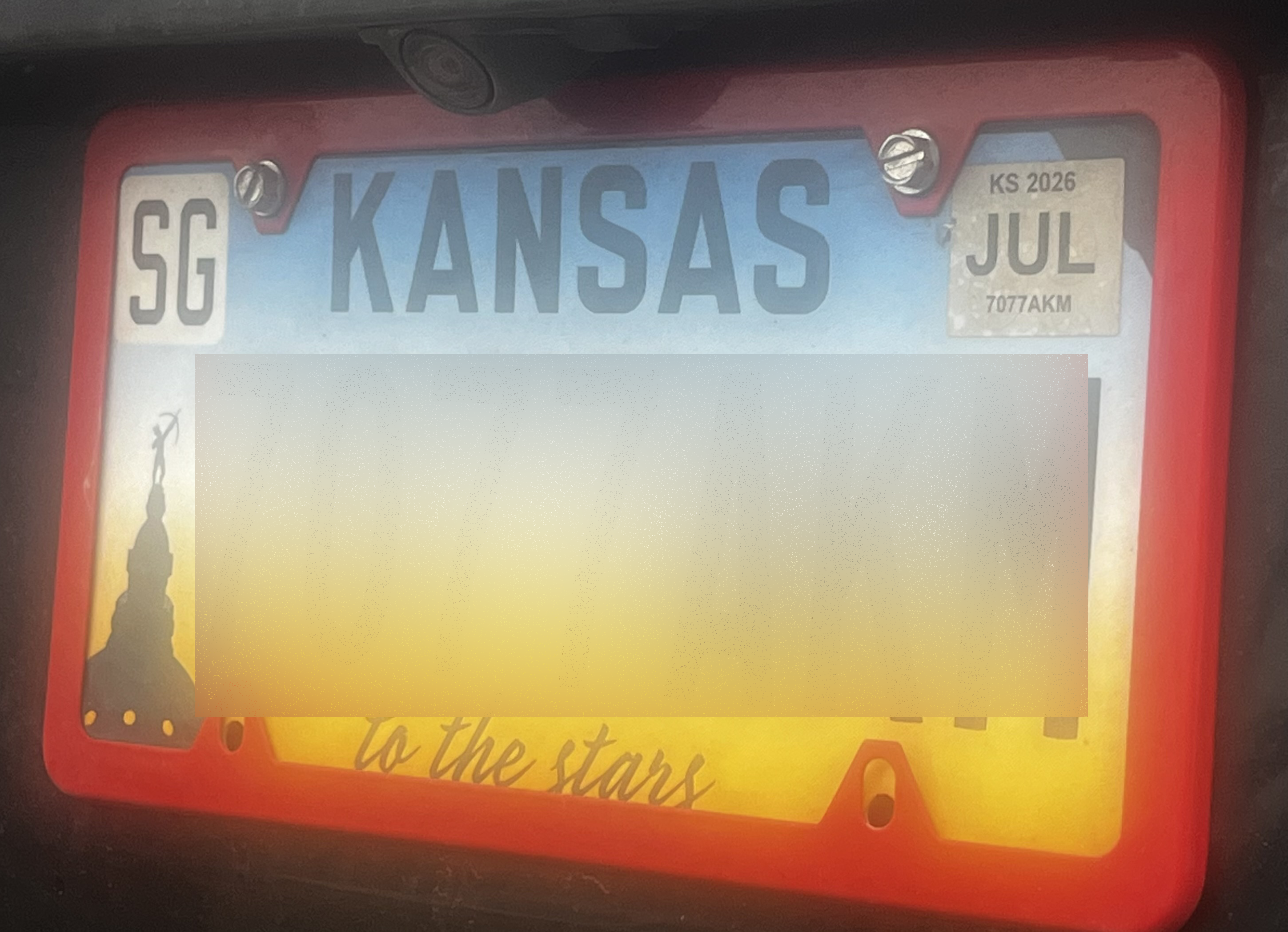 A new state law takes effect on July 1, requiring any license plate frame to not cover the registration, state name of month of expiration decal. (Hutch Post photo) 
