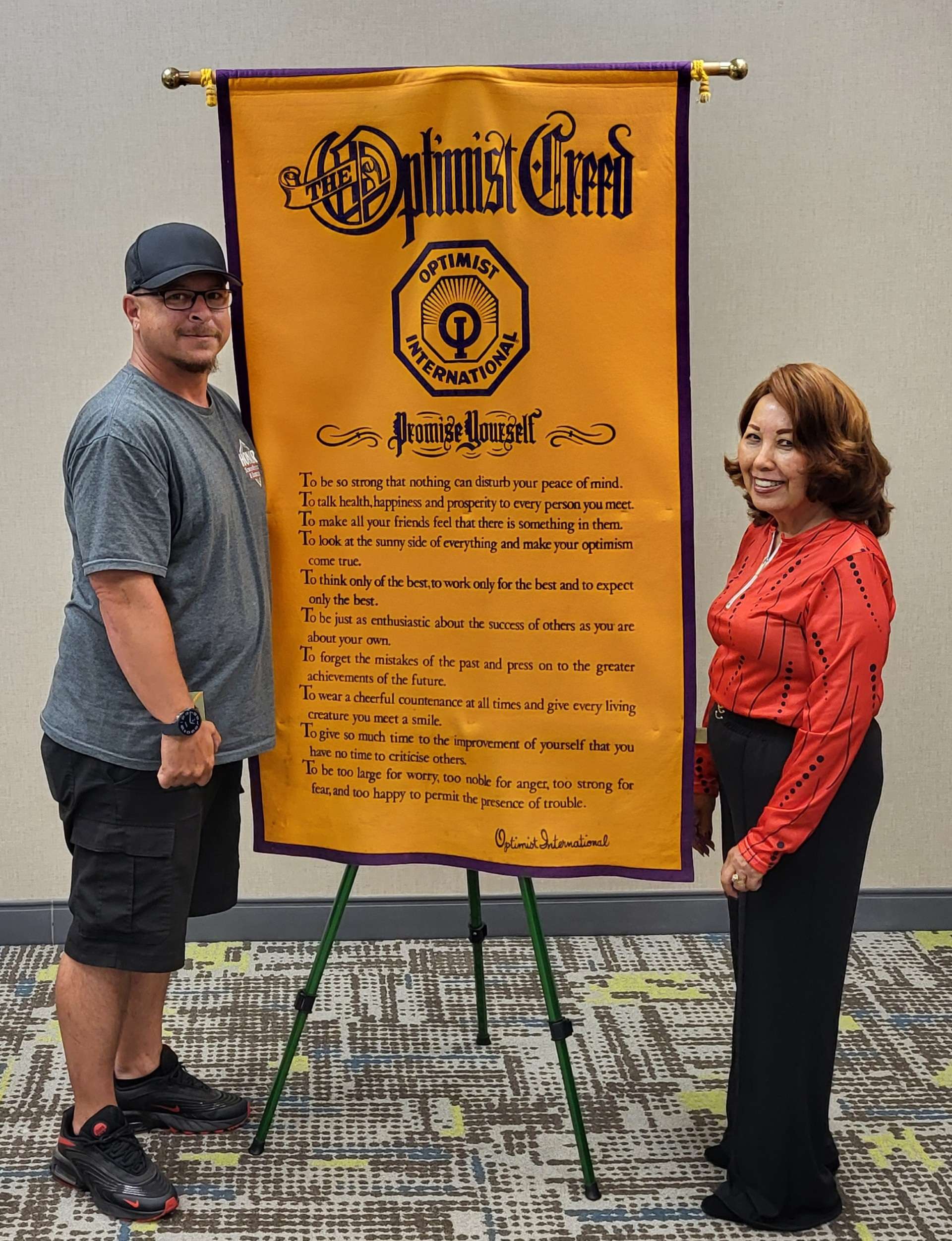 Speaker Brett Robison of JC Baseball Association with Nita Miller, President of JC Breakfast Optimist Club