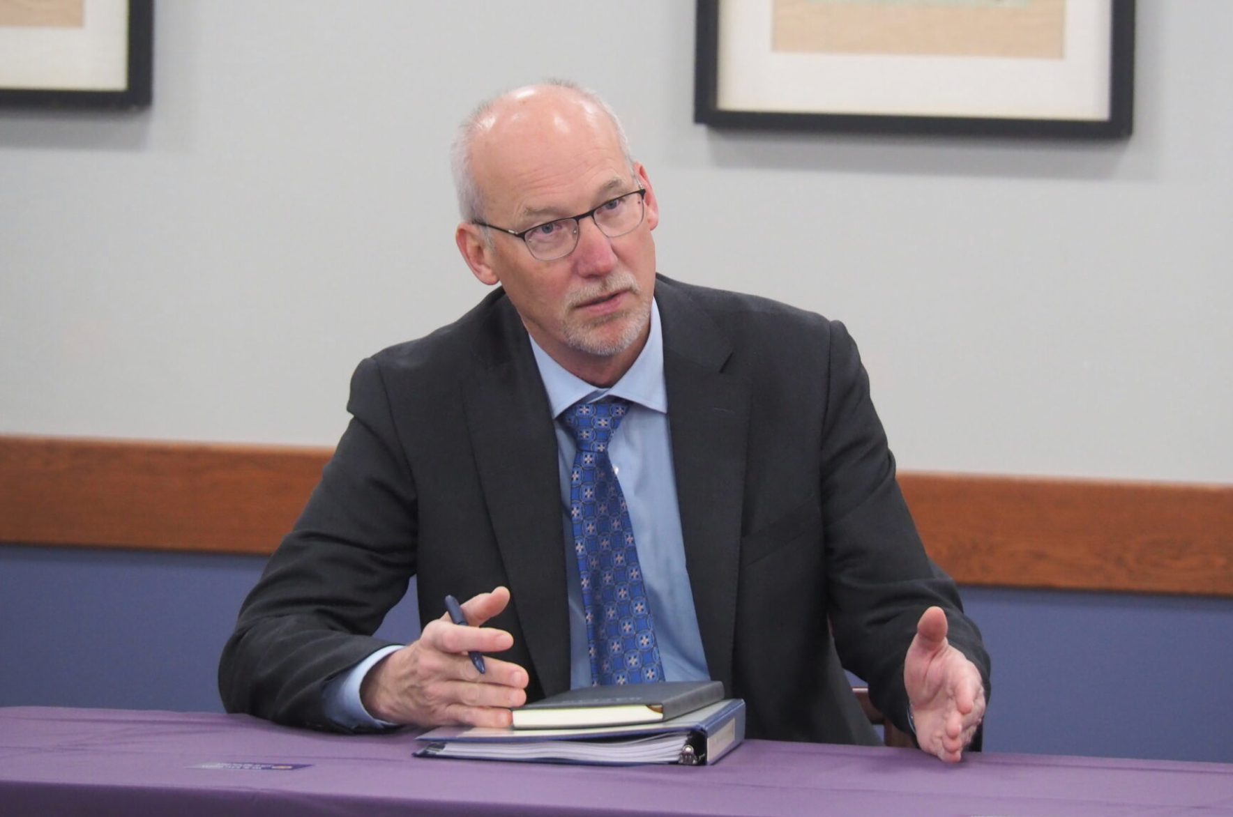  Blake Flanders, who served 10 years as president and CEO of the Kansas Board of Regents, is retiring July 31. During his final Board of Regents meeting in Topeka, he offers thoughts on the financing of collegiate athletics, child literacy, successes of university students and economic development. (Photo by Tim Carpenter/Kansas Reflector)