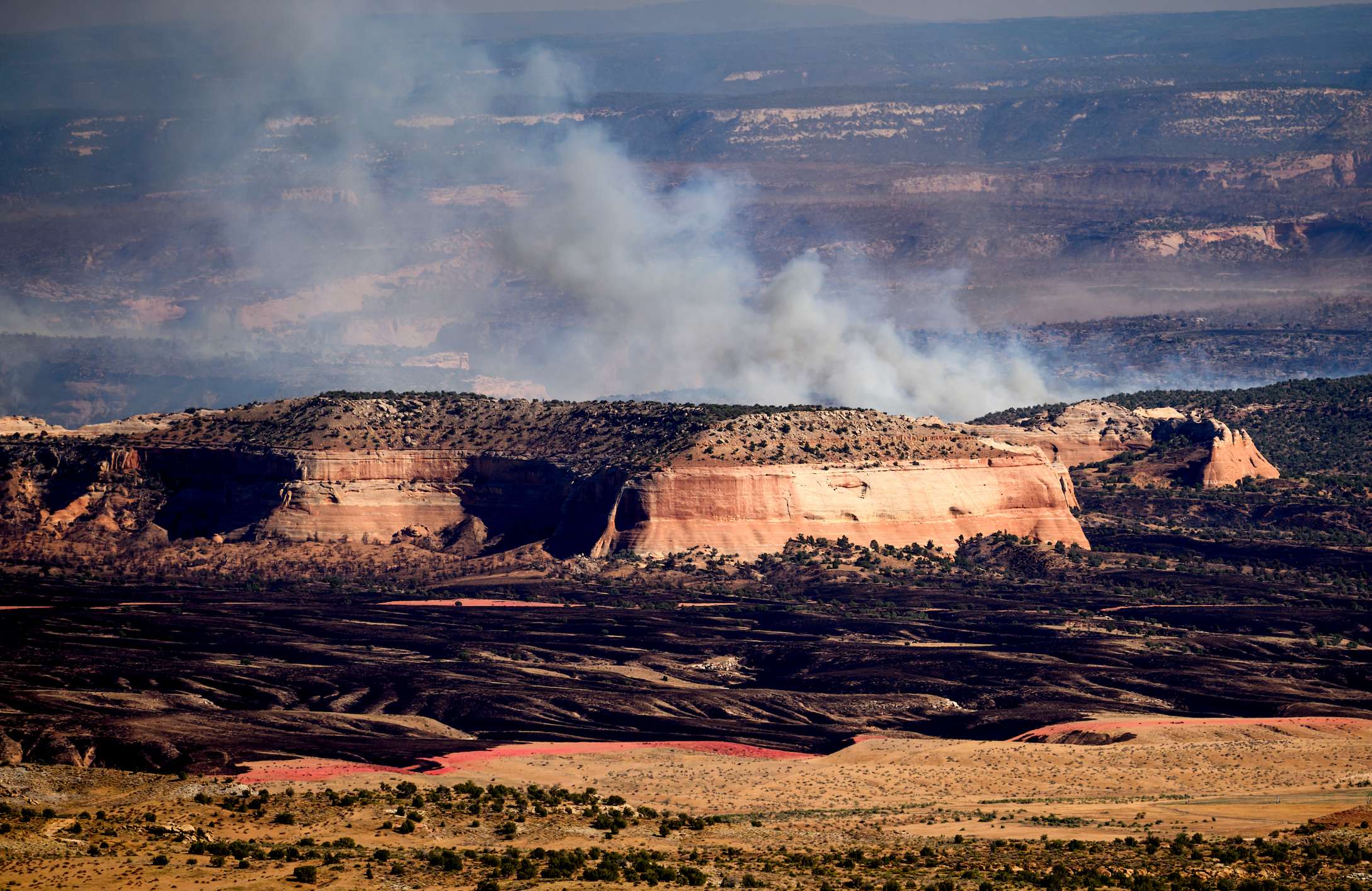 The Snyder Fire burns near Thompson Springs, Utah, on Sunday, June 28, 2026. (AP Photo/Noah Berger)