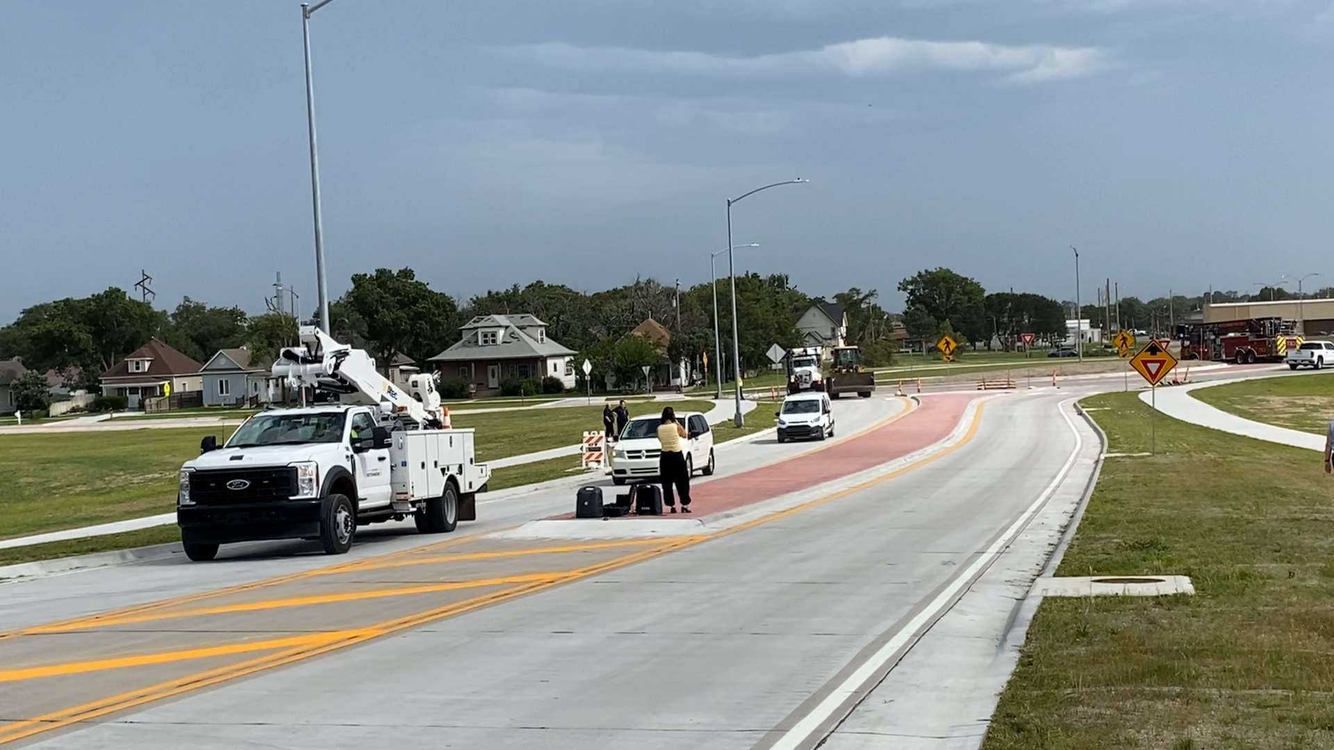 City of Hutchinson vehicles make their way around the Avenue A roundabout. - Hutch Post photo.
