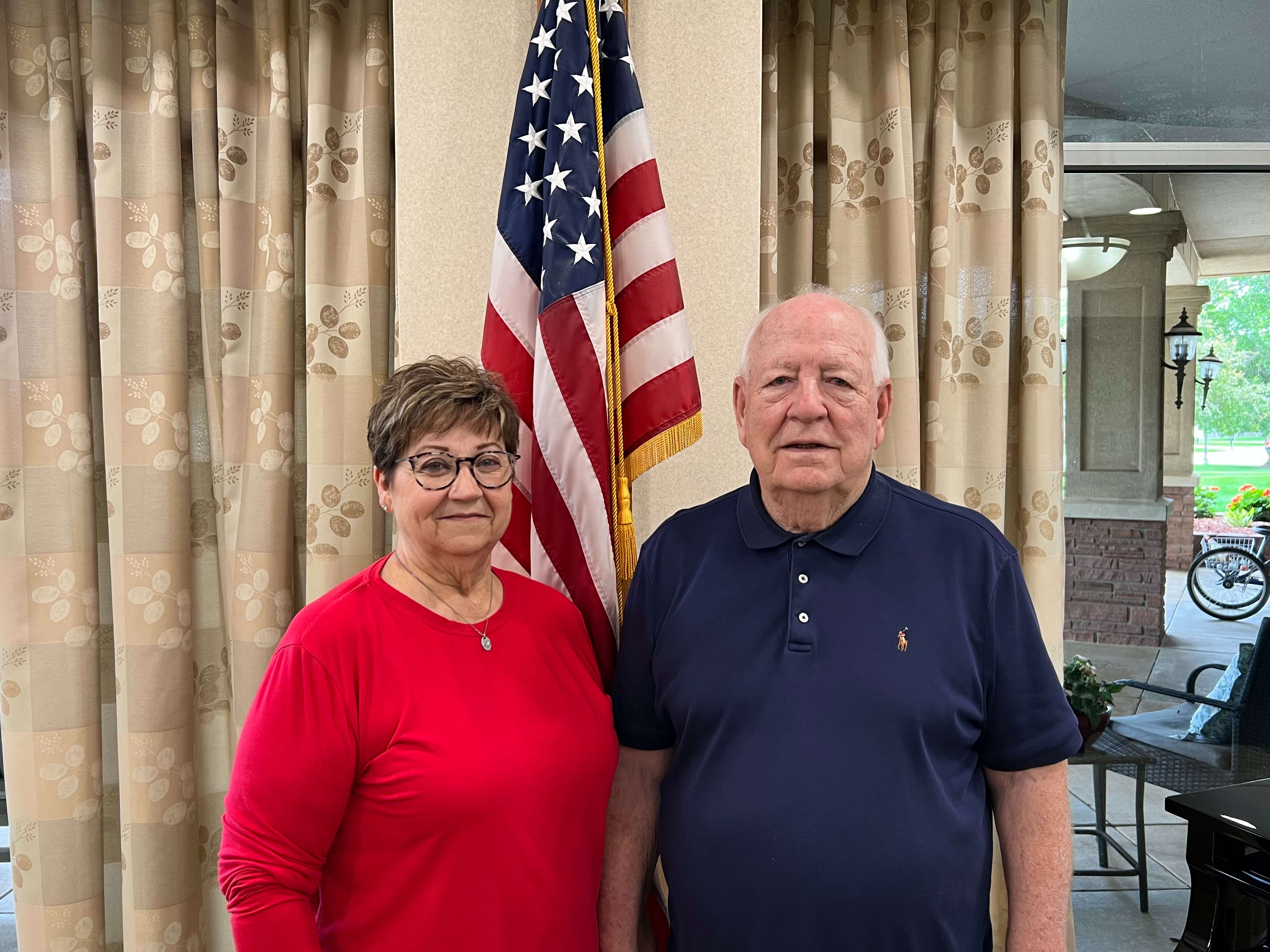 Linda Barkley, left, and Jim Barkley pose in the lobby of The Wesley on Tuesday, June 30, 2026, in Hutchinson, Kan. Jim Barkley will serve as grand marshal for the 2026 Patriots Parade on Saturday, July 4. (Hutch Post Photo/Sean Boston)