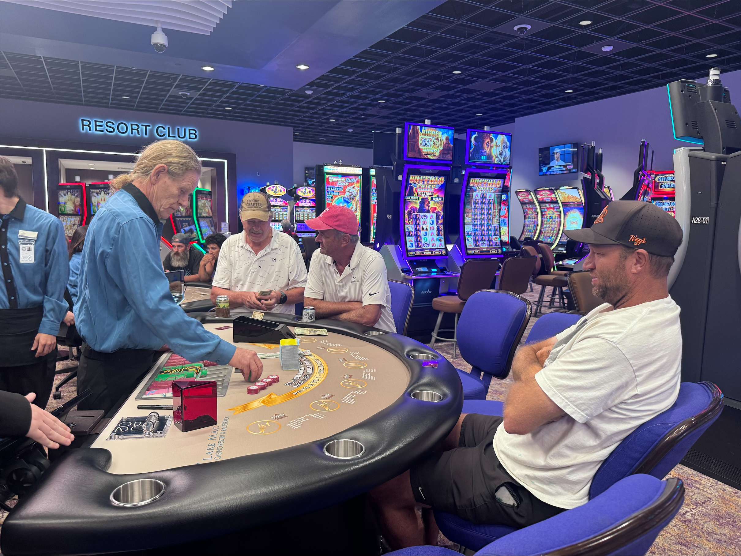 Guests gather around a live Blackjack table after Lake Mac Casino Resort &amp; Racetrack unveiled its new live table games during a ribbon cutting ceremony Tuesday afternoon in Ogallala. (Carla Beck | The Post)