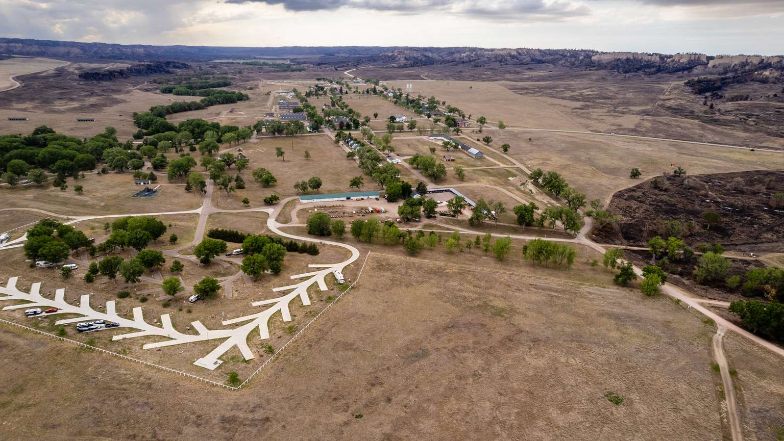 With a blackened landscape nearby, Fort Robinson State Park's historical buildings stand unscathed. Justin Haag, Nebraska Game and Parks Commission