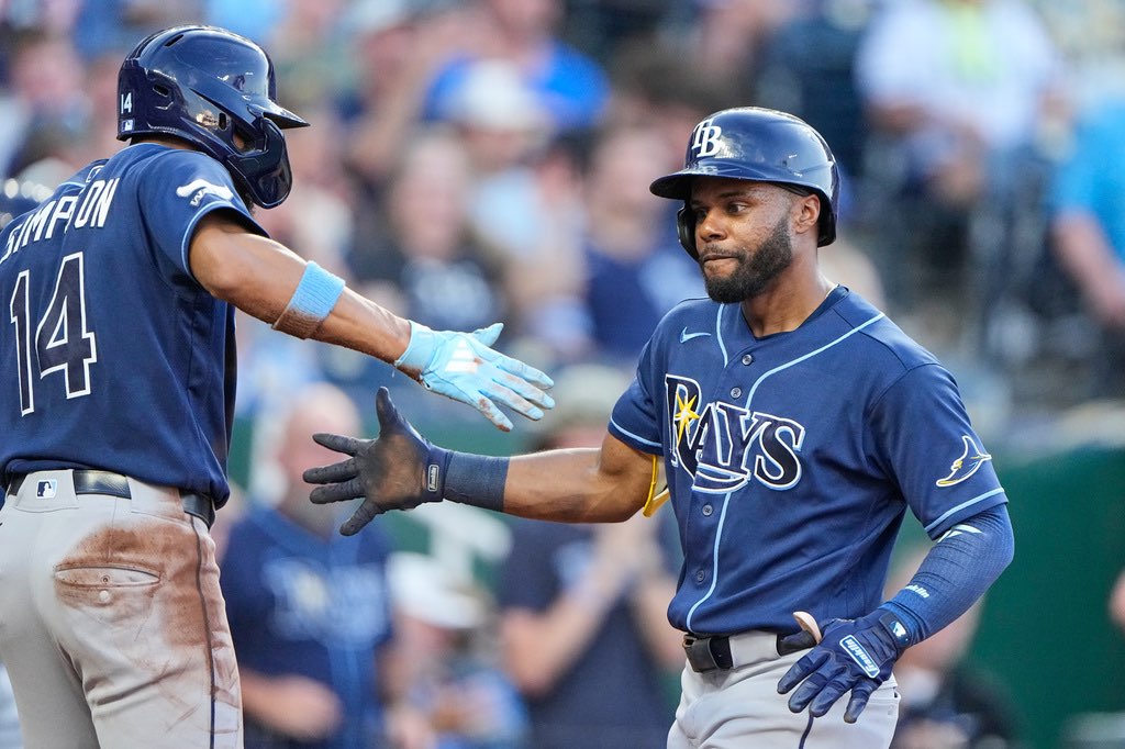 Tampa Bay Rays' Cedric Mullins, right, celebrates with Chandler Simpson (14) after hitting a two-run home run during the fifth inning of a baseball game against the Kansas City Royals, Thursday, July 2, 2026, in Kansas City, Mo. (AP Photo/Charlie Riedel)