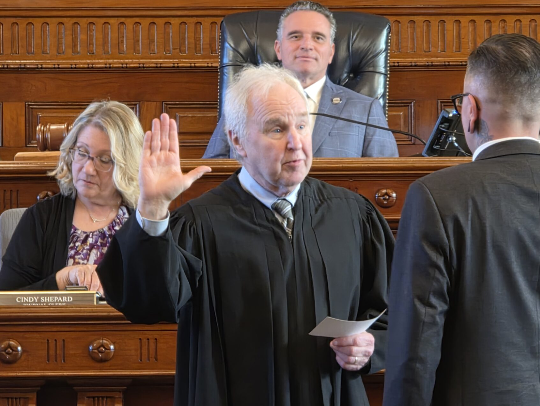 Kansas Supreme Court Justice Eric Rosen requests Kansans draw appreciation from the Declaration of Independence, the U.S. Constitution and the Kansas Constitution in terms of the importance of government anchored to the rule of law. In this January 2026 image, Rosen administers the oath of office to a legislator at the Capitol. (Photo by Morgan Chilson/Kansas Reflector)