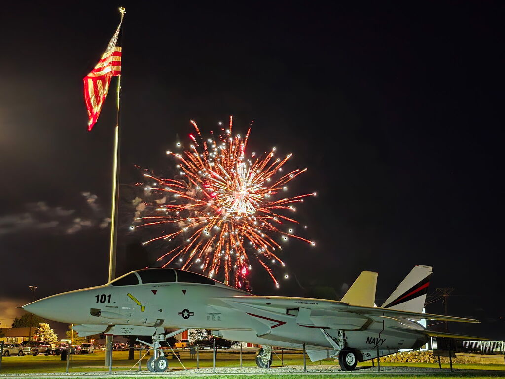A fully refurbished F-14 Tomcat with fireworks going off in the background. Photo courtesy of CJ "Heater" Heatley&nbsp;