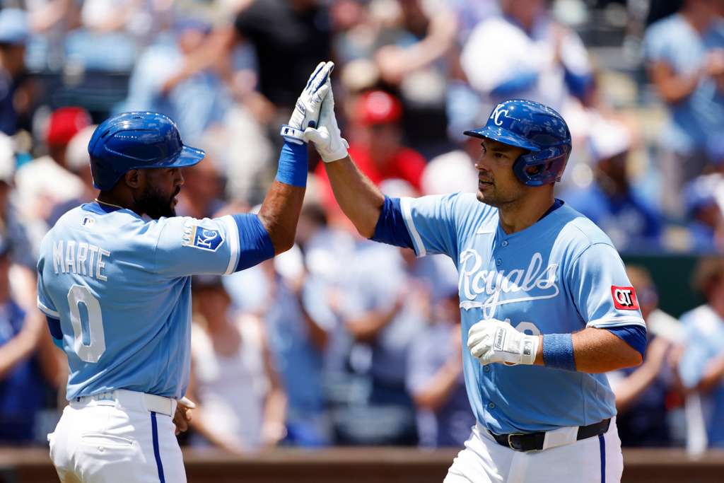 Kansas City Royals' Luke Maile, right, celebrates his three-run home run with Starling Marte (0) during the first inning of a baseball game against the Philadelphia Phillies in Kansas City, Mo., Monday, July 6, 2026. (AP Photo/Colin E. Braley)