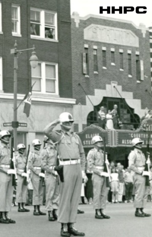 Strand Theatre during military parade - c. 1958 - 103 N. Main. Courtesy of the Conard-Harmon Collection.