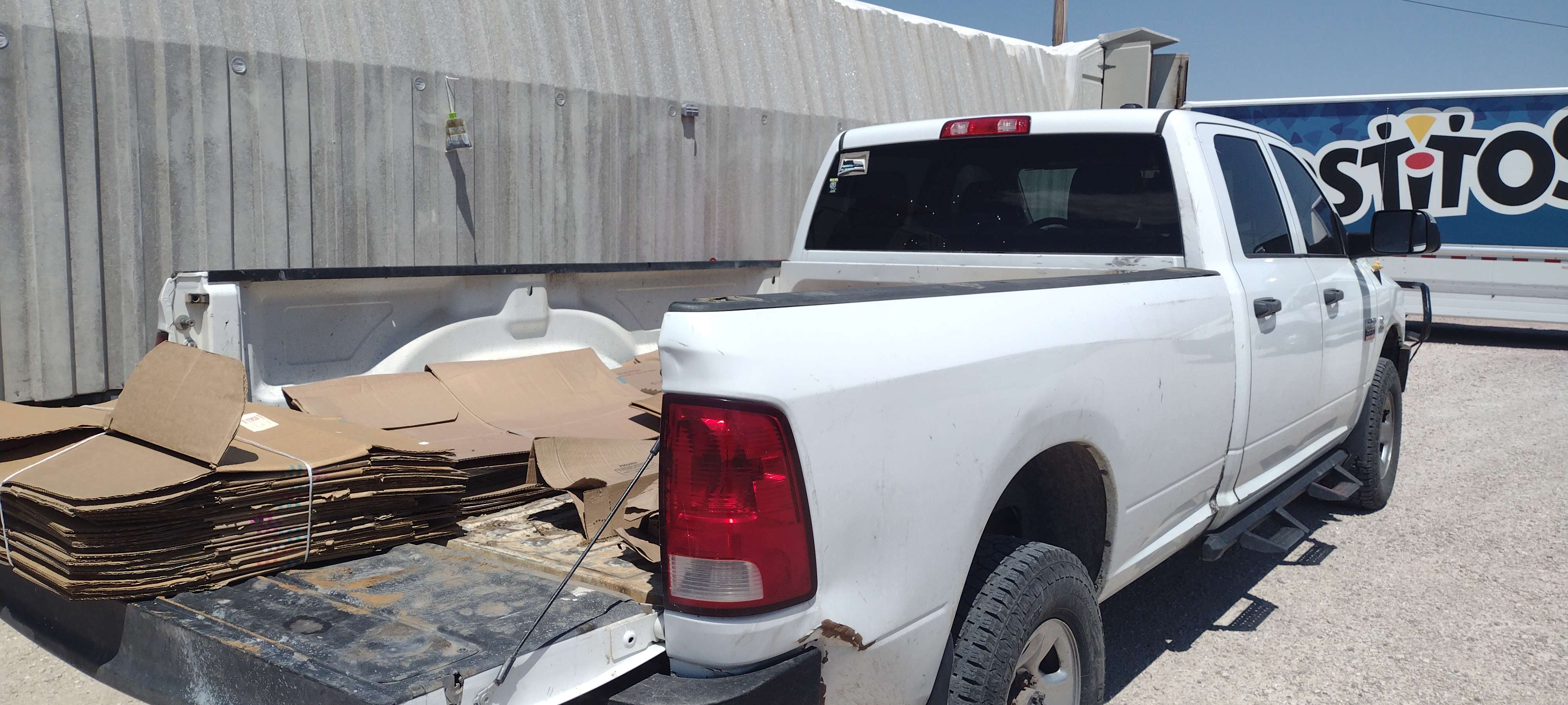Cardboard from Frito Lay fills the bed of KAB's new pickup.