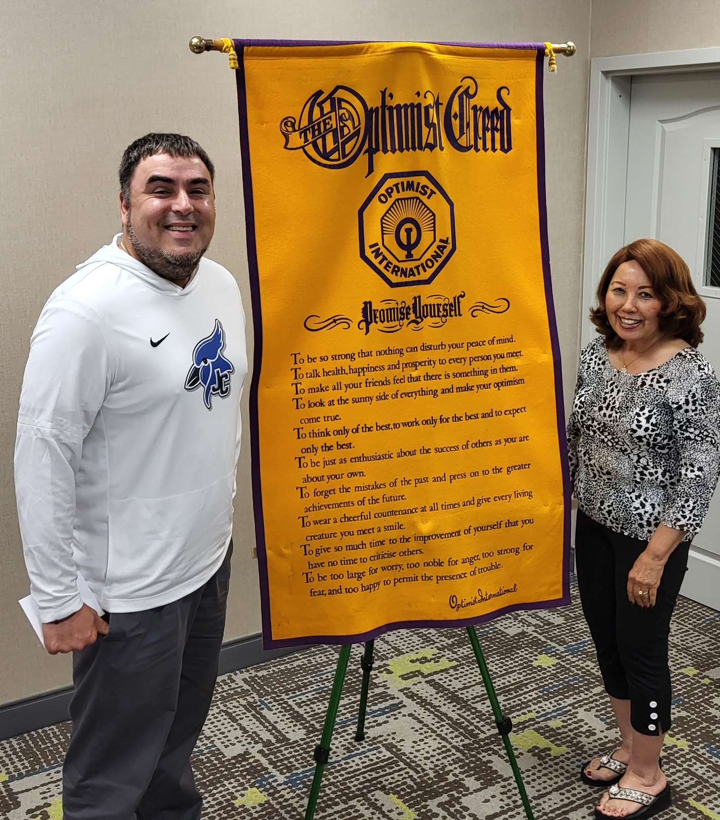 Pictured on the left, Matt Hoover, Director of Communications at USD 475 and Nita Miller, President, Junction City Breakfast Optimist Club.