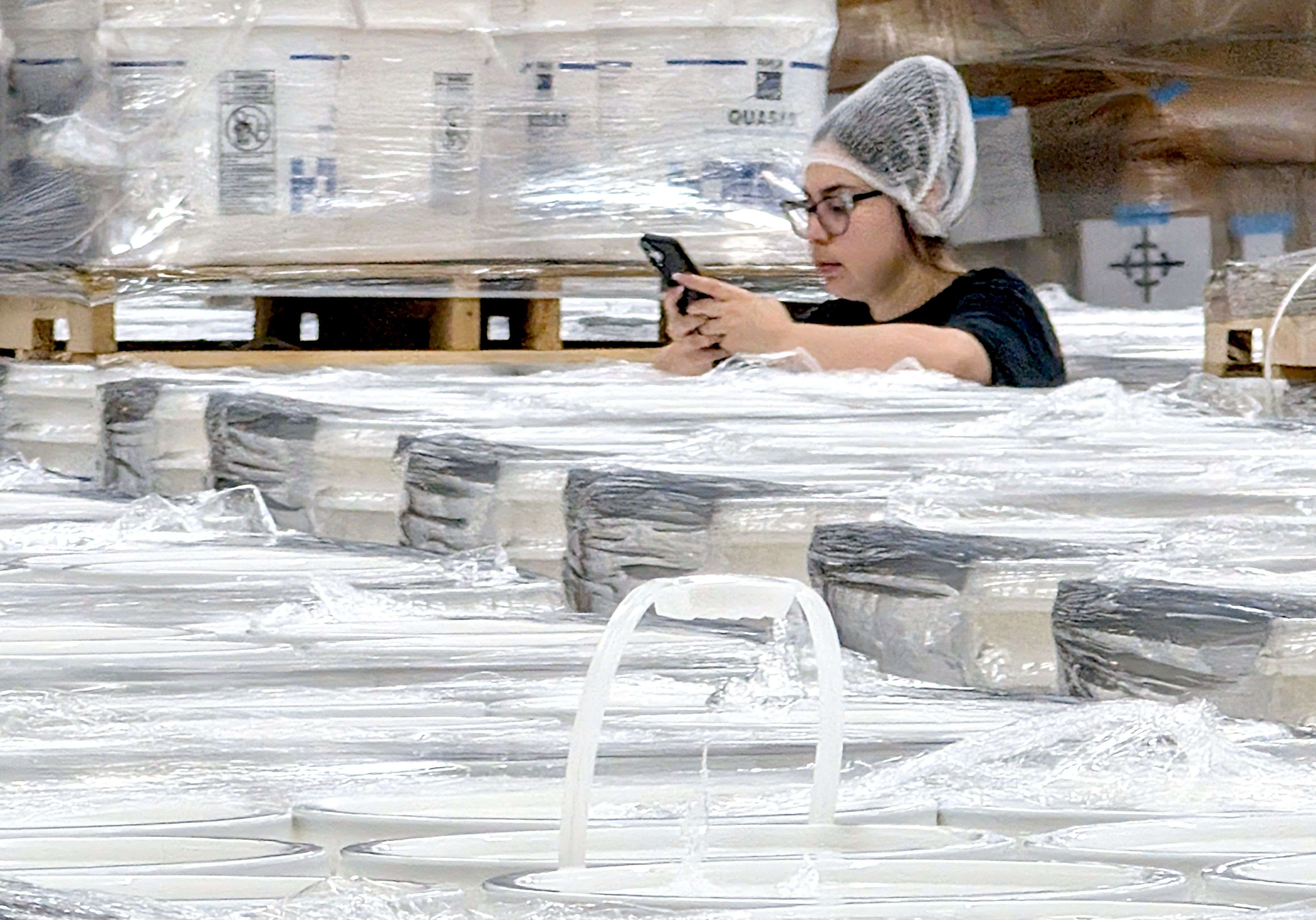 A Fuller Industries employee inventories buckets of cleaning products ready for shipment. The company tailors its line of commercial cleaning products to handle a wide variety of environments while helping customers improve efficiency and profitability in today’s challenging economy.