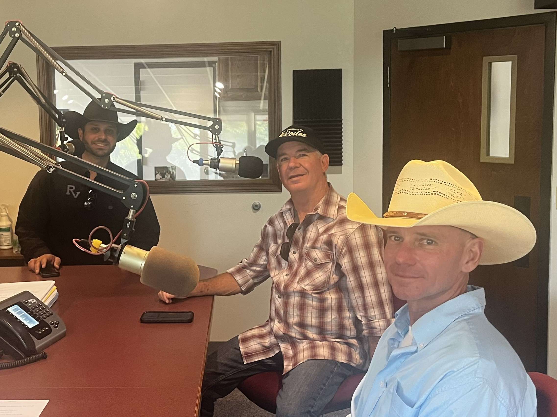 Anthony Lucia, Robby Hodges and Josh White (L-R) from the Pretty Prairie Rodeo talk about this year's rodeo.
