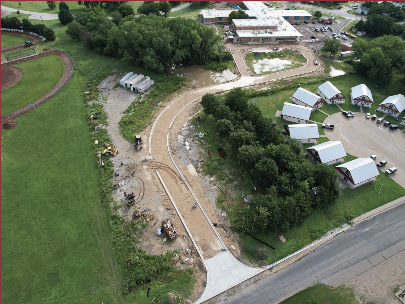 Work continues on a new drive on the south side of O'Loughlin that district leaders hope will allow more stacking of vehicles during pick up and drop off. Courtesy photo