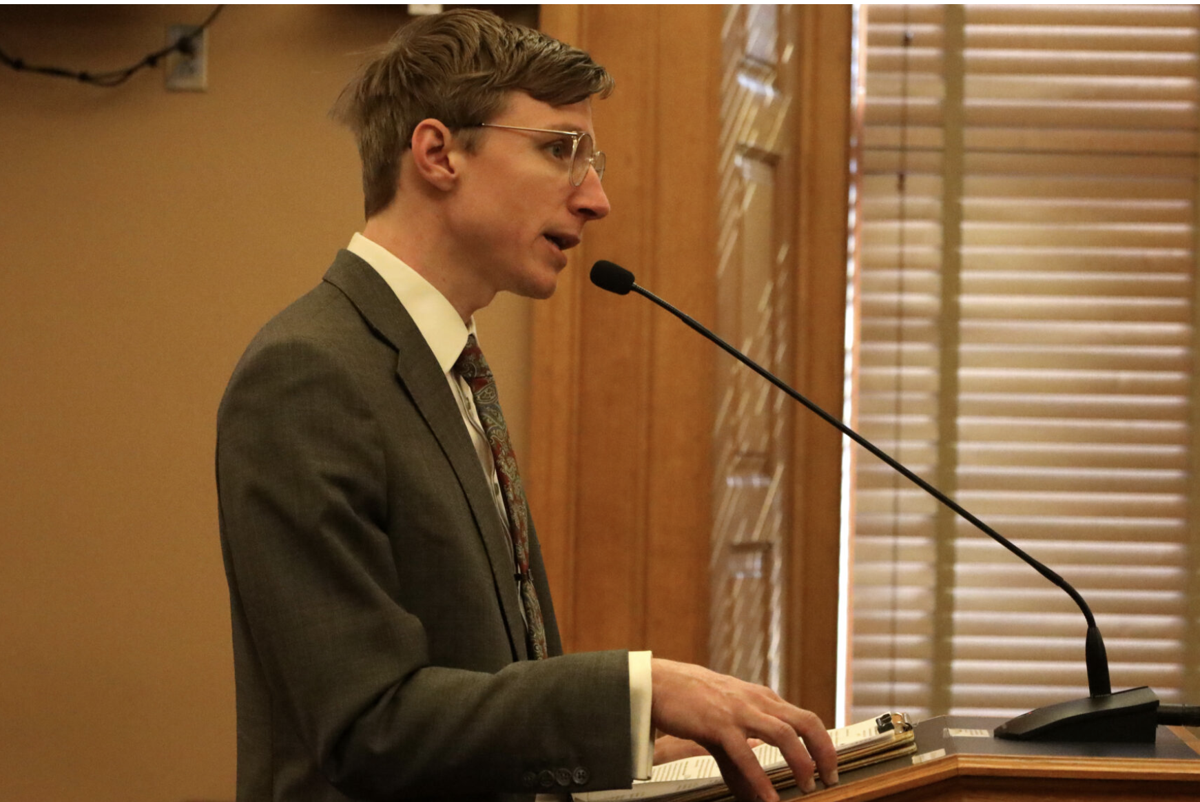 Davis Hammet, president of the voter advocacy group Loud Light that is among plaintiffs in a lawsuit challenging a 2025 state law ending the three-day grace period for mail-in ballots, argues during a Jan. 22, 2025, legislative hearing against a bill declaring only mailed ballots arriving in county offices by 7 p.m. Election Day can be counted. A Douglas County judge issued a temporary injunction forbidding use of the law pending a lawsuit challenging constitutionality of the statute. (Photo by Grace Hills for Kansas Reflector)