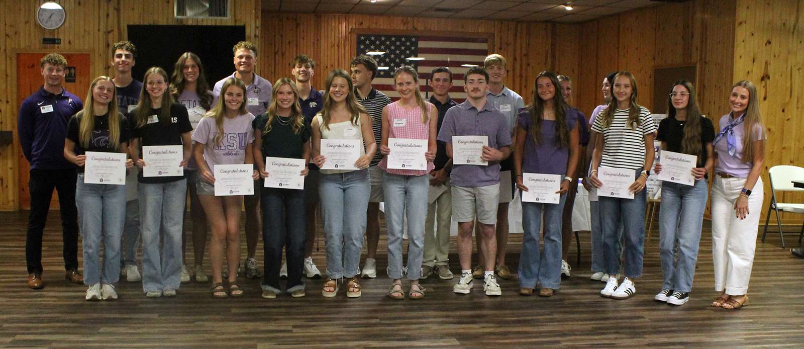 Local students who received K-State scholarships during the annual Catbackers dinner in Hays on July 10. Joinng for the photos on either end of the group were two K-State student ambassadors. Photo by Cristina Janney/Hays Post