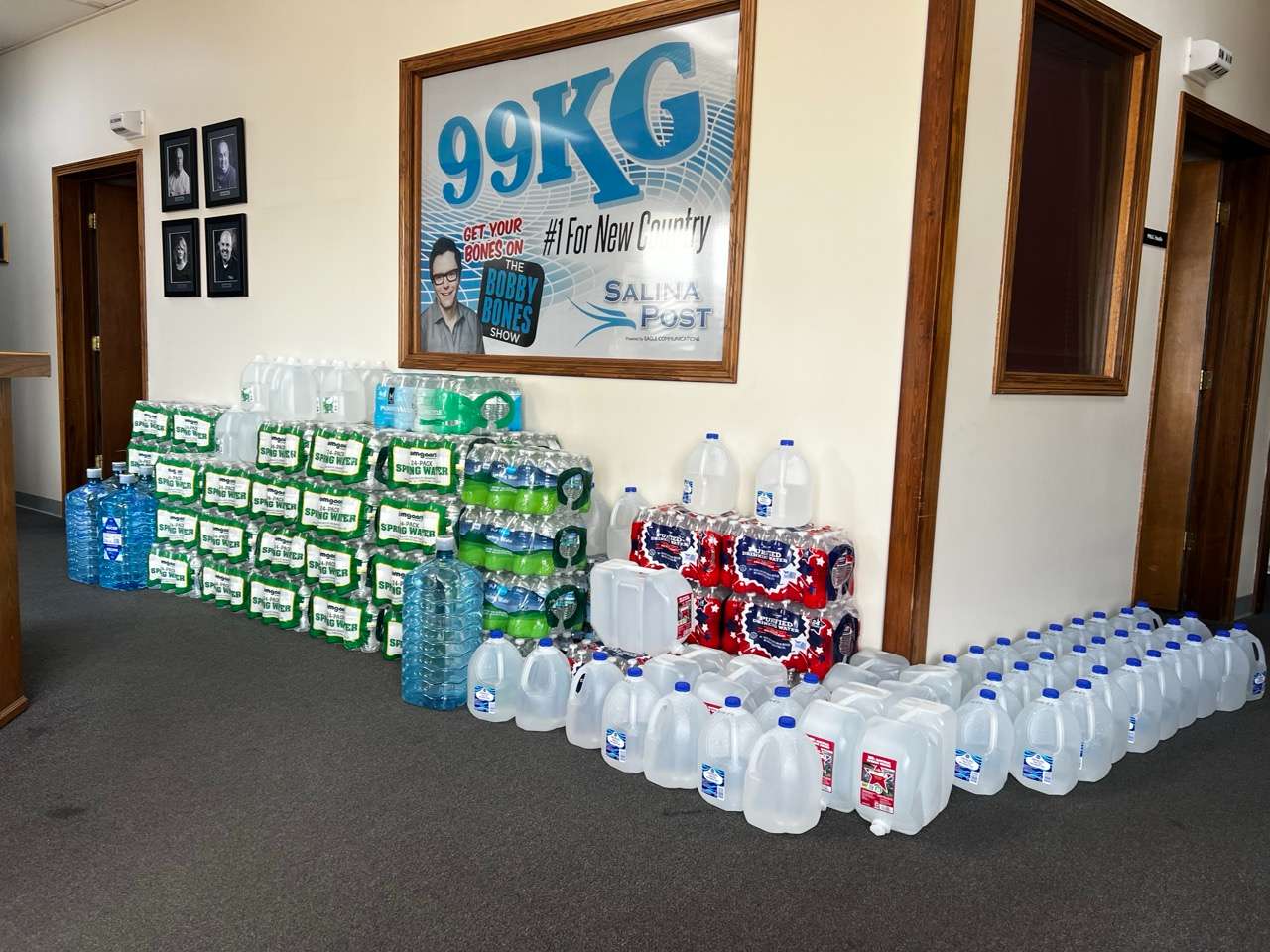 Water collection stacked up at Eagle Media radio stations in Salina for residents affected by the water quality issues - Photo, Nicolas Fierro