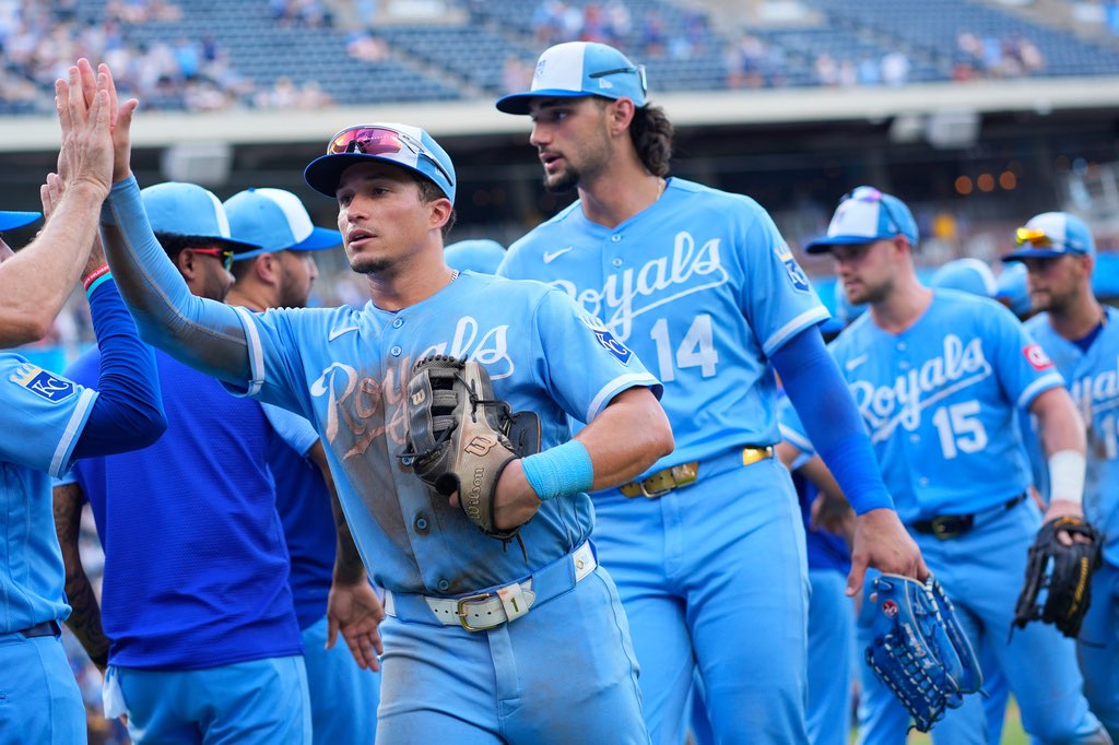 Kansas City Royals' Isaac Collins celebrates with teammates after their baseball game against the San Diego Padres, Saturday, July 18, 2026, in Kansas City, Mo. (AP Photo/Charlie Riedel)