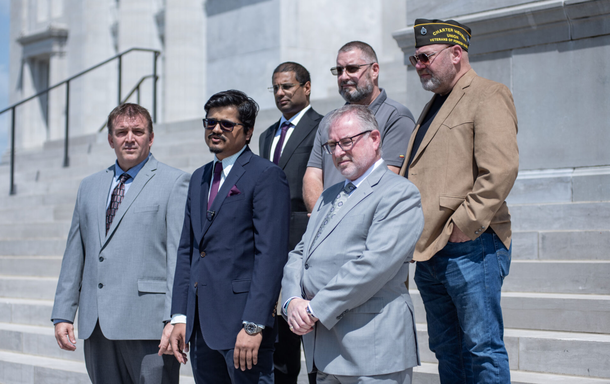 Missouri hemp producers and others in the industry speak April 14 at a news conference outside the Missouri Capitol Building against a bill banning intoxicating hemp products before asking Gov. Mike Kehoe to veto the legislation (Annelise Hanshaw/Missouri Independent).