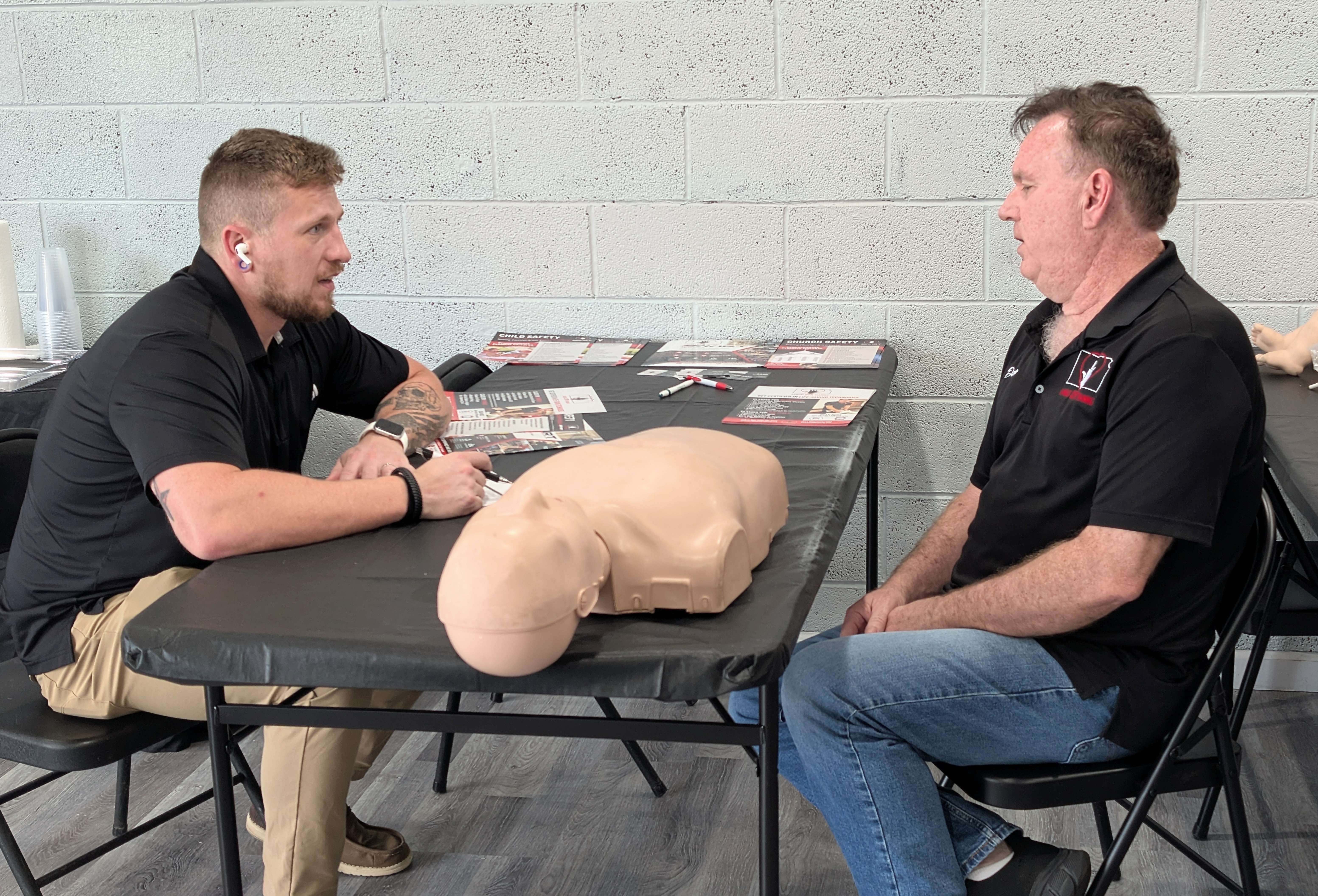 CPR Training owner Dean Nuss offers training to Kevin Woods at his Great Bend business last Friday. Nuss has expanded its life-saving curriculum by introducing HSI’s Active Violence Immediate Response Training.