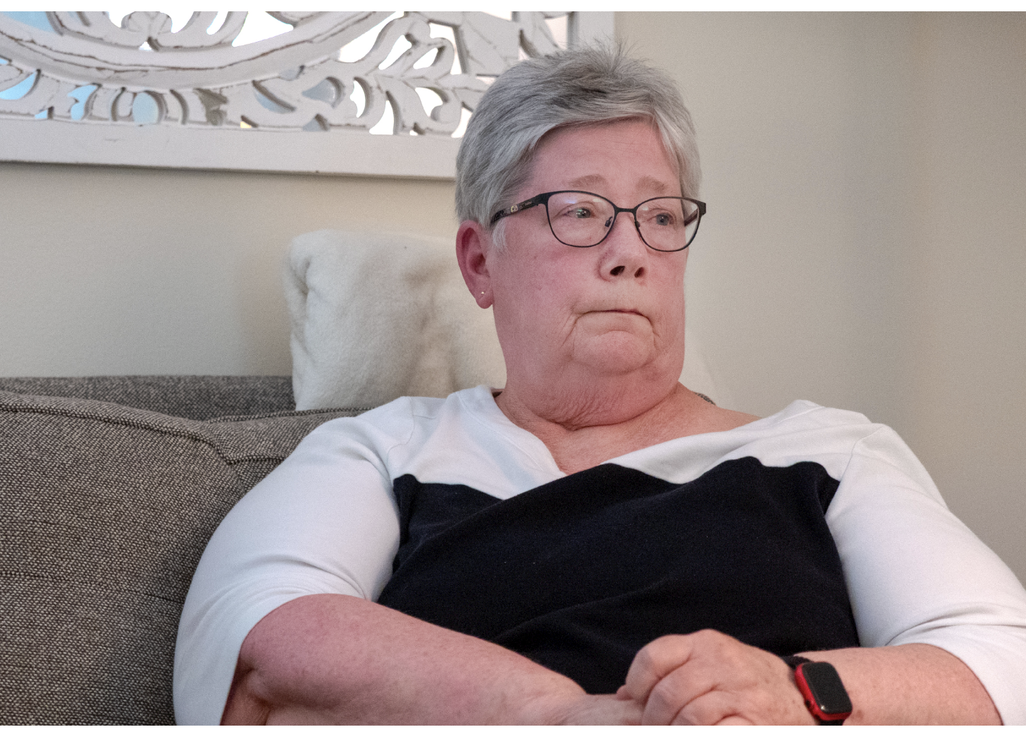 Sue Thompson, who worked as Adam Hamilton’s longtime personal assistant at Church of the Resurrection, talks to reporters during a July 15, 2026, interview in Leawood. Thompson criticized Hamilton’s leadership style but said she would still rather vote for him than Republican U.S. Sen. Roger Marshall. (Photo by Sherman Smith/Kansas Reflector)