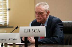 Former Nebraska head football coach and former U.S. Rep. Tom Osborne testifies against legislative efforts to legalize online sports wagering on Wednesday, July 31, 2024. (Zach Wendling/Nebraska Examiner)
