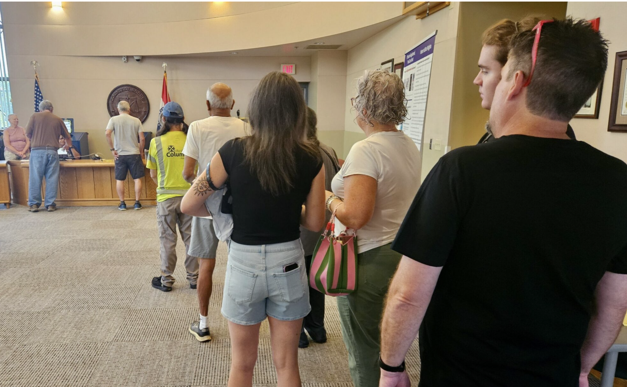 Voters line up Wednesday morning at the Roger B. Wilson Boone County Government Center in Columbia. They are using the “no excuse absentee” law to vote early in the Aug. 4 primary election (Rudi Keller/Missouri Independent).