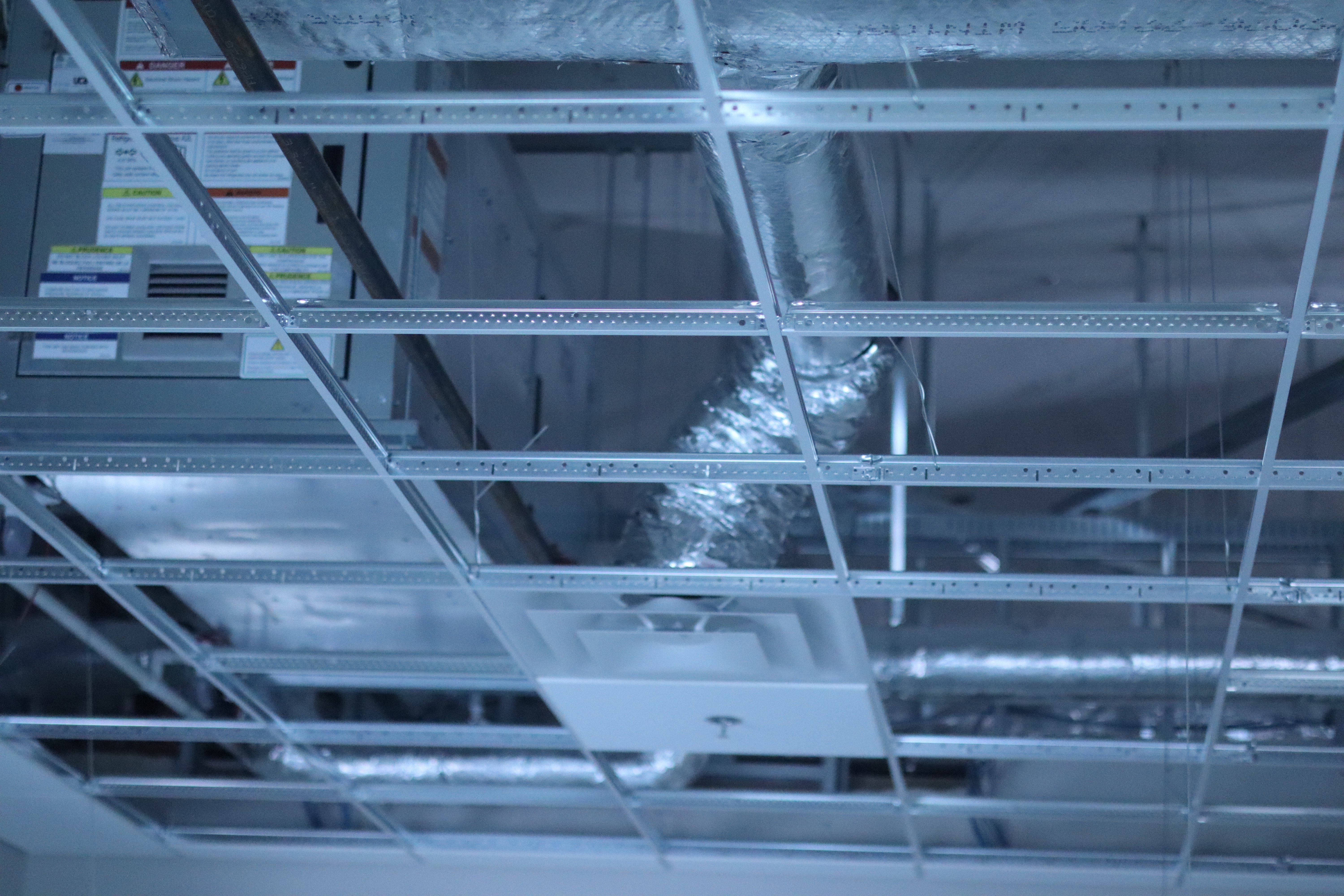 Ceiling installation continues inside the new Hays Police Department Law Enforcement Center ahead of the department's planned move this fall. Photo by Alin Hett/Hays Post.&nbsp;<br>