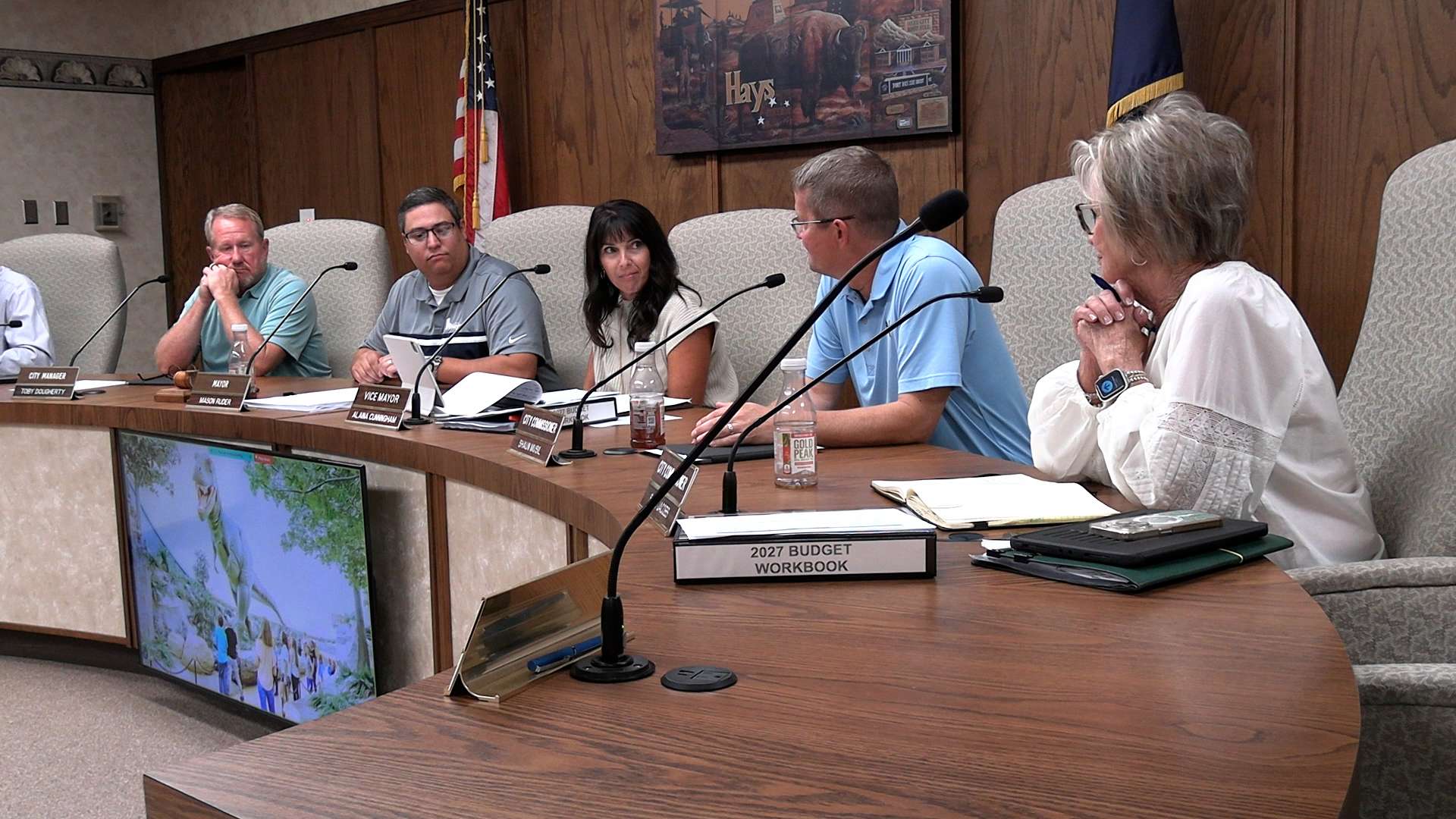 Hays city commissioners along with Toby Dougherty, city manager (left), during their July 23, 2026 meeting. Commissioner David Vilaysing joined the meeting via Zoom. Photo by Becky Kiser/Hays Post