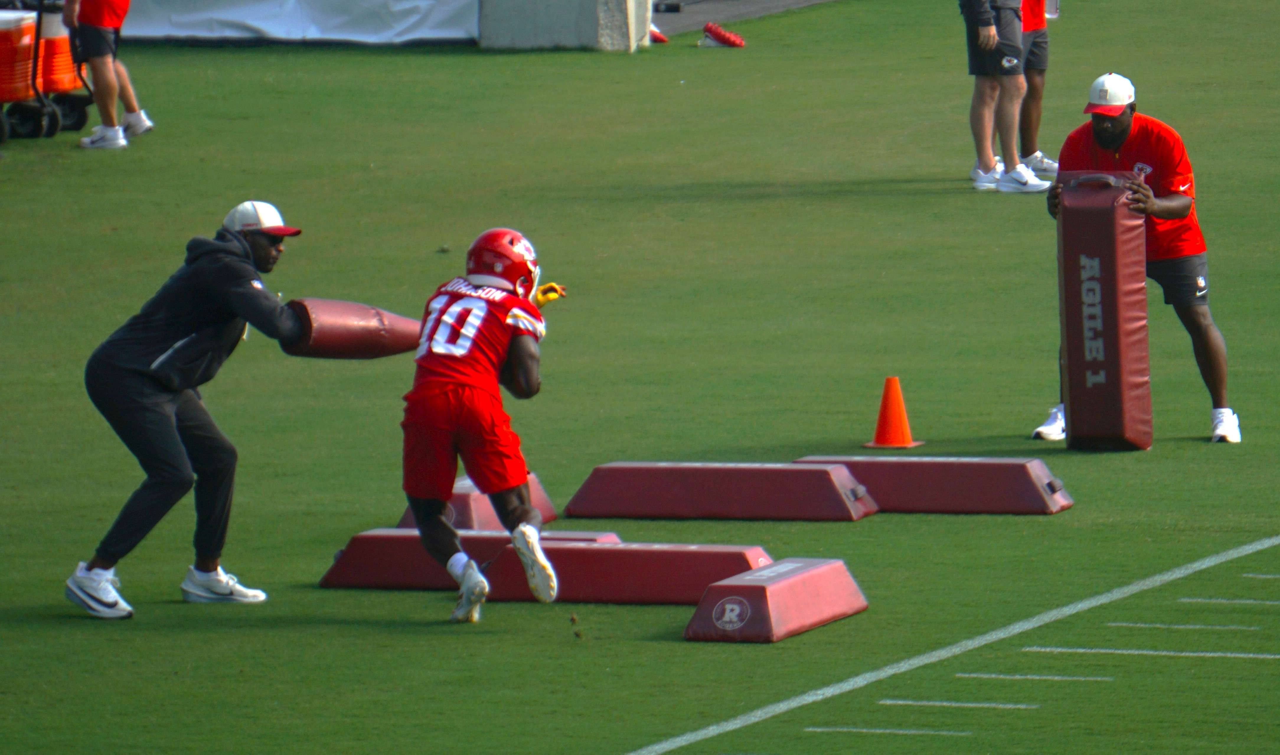 Emmett Johnson runs drill/ Photo by Matt Pike