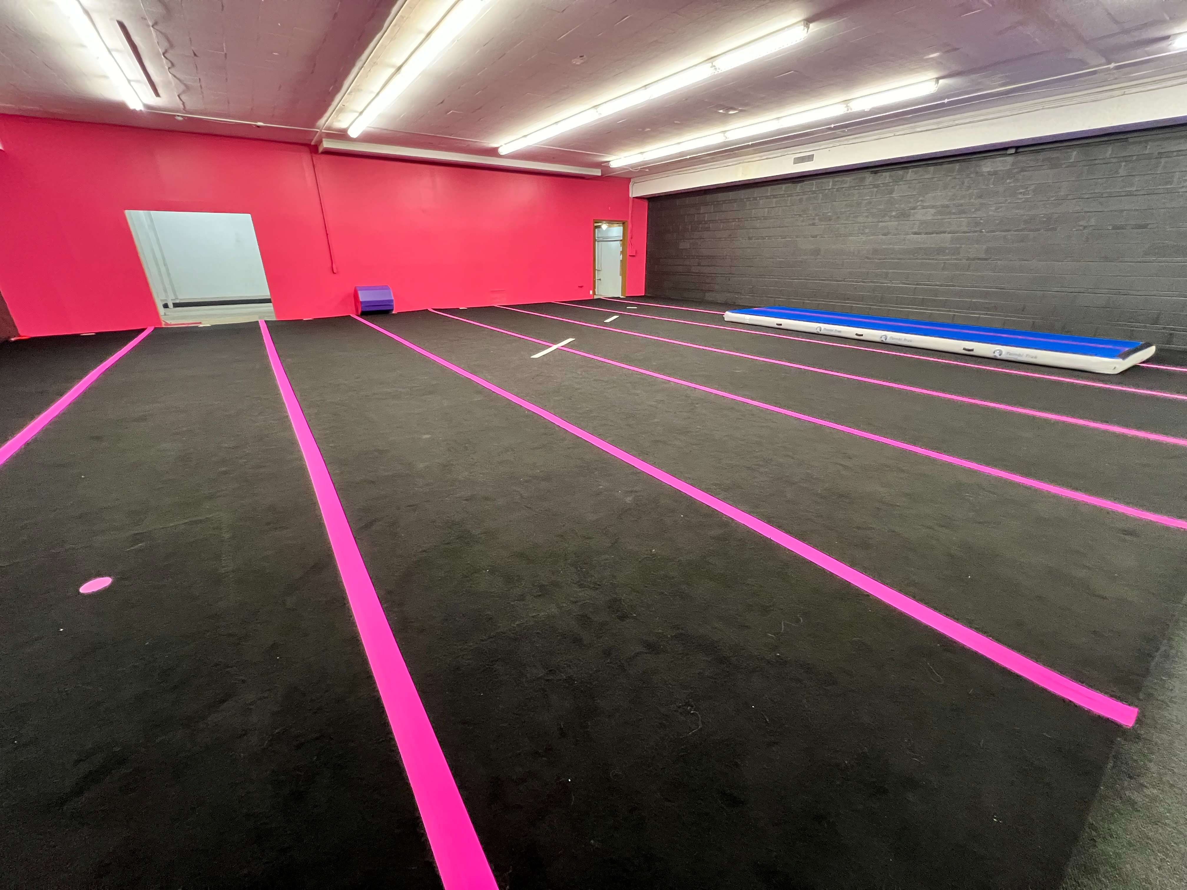 The main competition floor at Legendz Xtreme Athletics features a spring floor, tumbling equipment and space for cheer, gymnastics and other training activities. The new gym is located at 722 E. Fourth Ave. in Hutchinson. (Hutch Post Photo/Sean Boston)