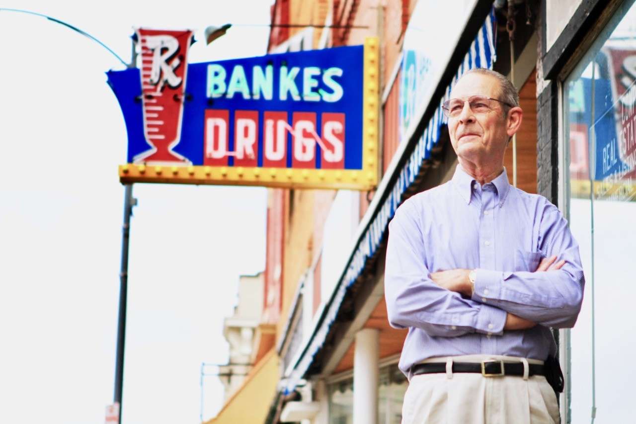 Bud stands in front of the drugstore he owned and his dad purchased in the early 1940s. Bud sold the drugstore in 2015.