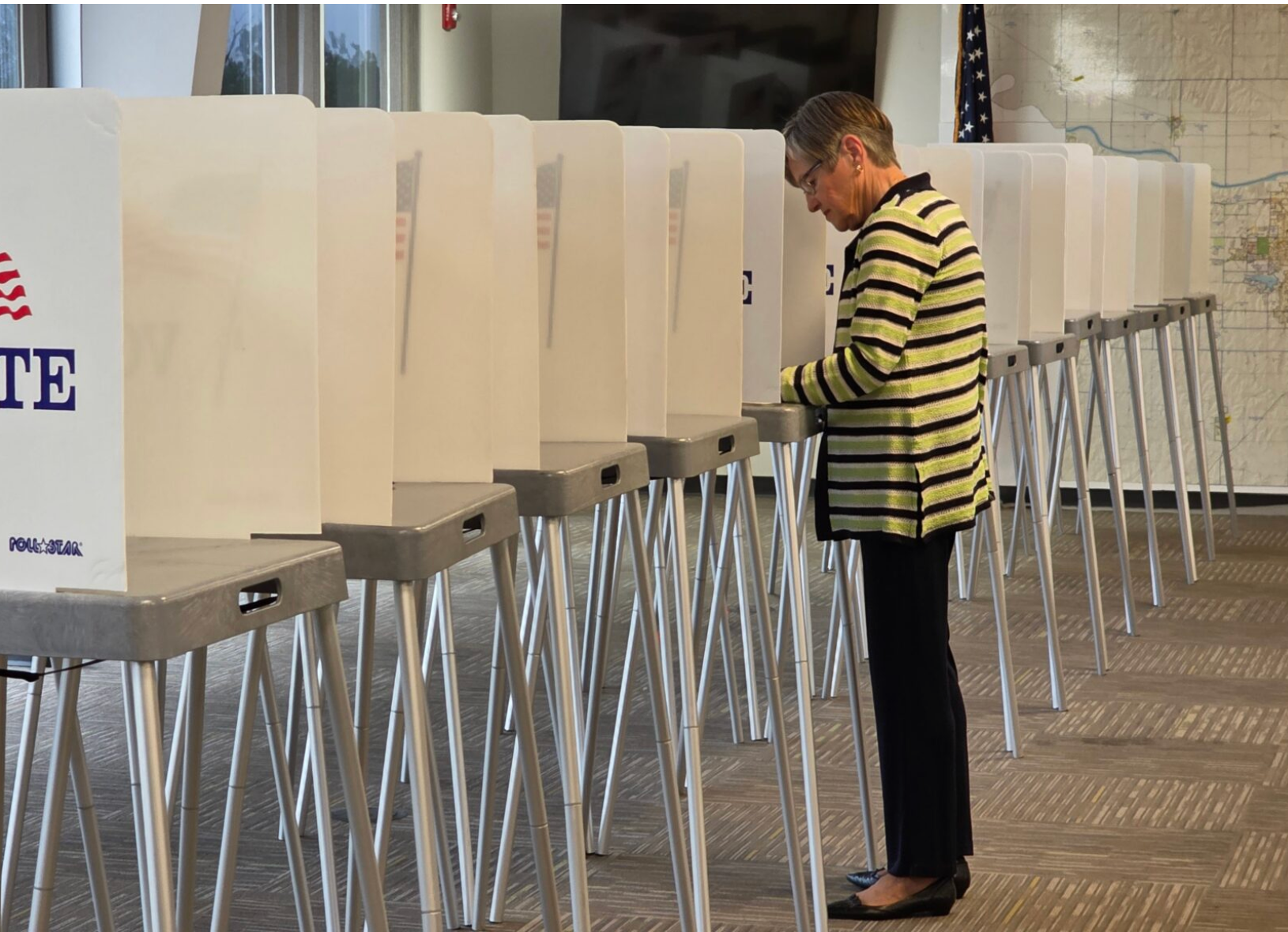  Gov. Laura Kelly fills out a ballot July 28, 2026, voting early in the Kansas primary election on Aug. 4. (Photo by Morgan Chilson/Kansas Reflector)