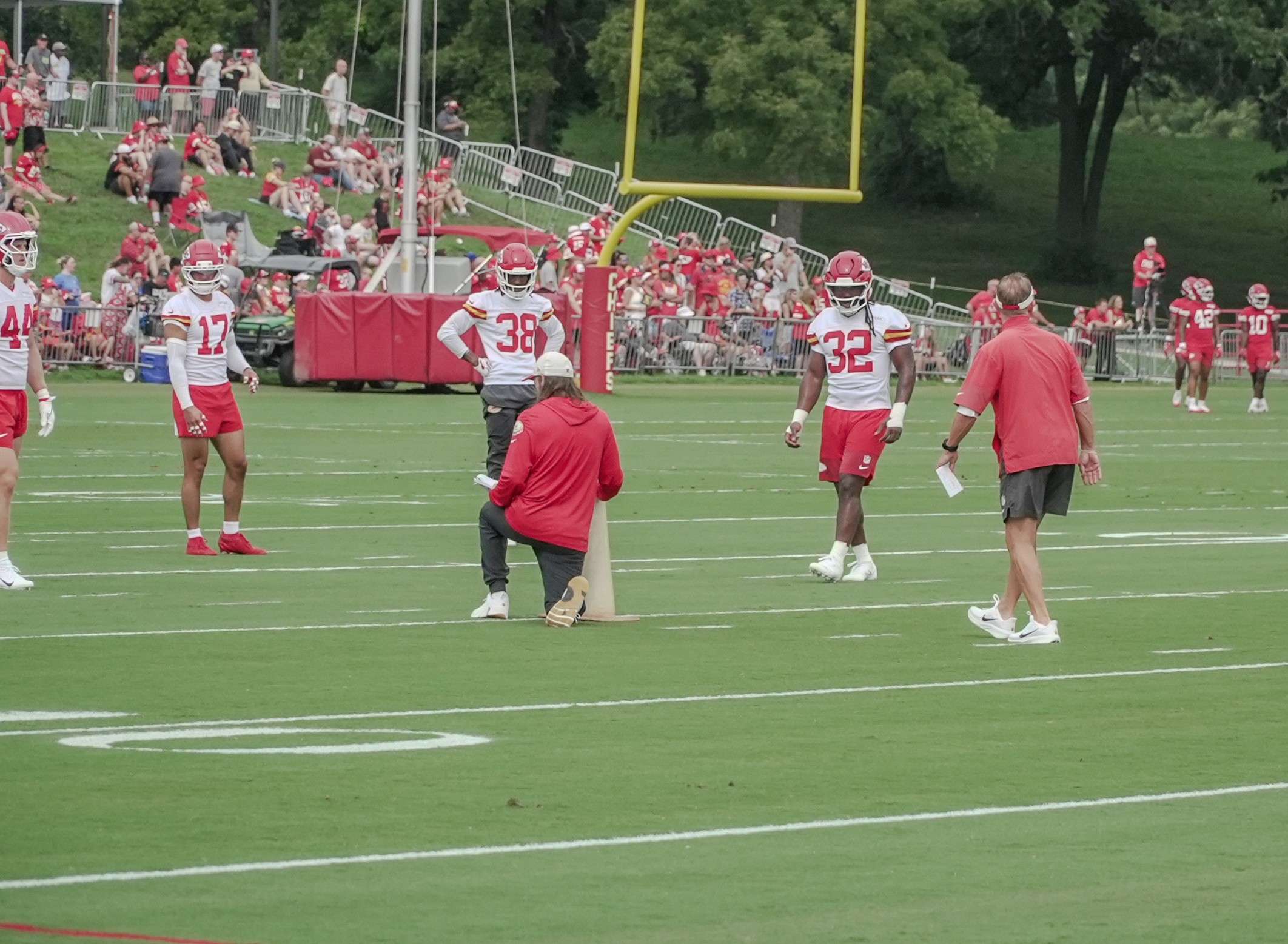 Chiefs linebacker Nick Bolton (32) runs through a drill alongside returning cornerback L'Jarius Sneed (38) and new safety Alohi Gilman (17)/ Photo by Justin Peacock