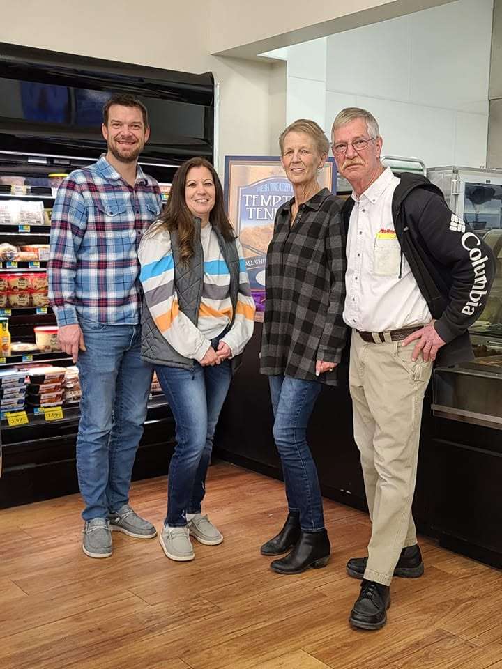 FILE PHOTO (March 2023): Scott and Kelli Carlson (left) stand with Bob and Sherry Maline inside Maline's Superfoods in Sutherland. The store announced July 30, 2026, that it will permanently close on Aug. 14 after serving the community for decades. (Photo courtesy Sutherland Chamber of Commerce)