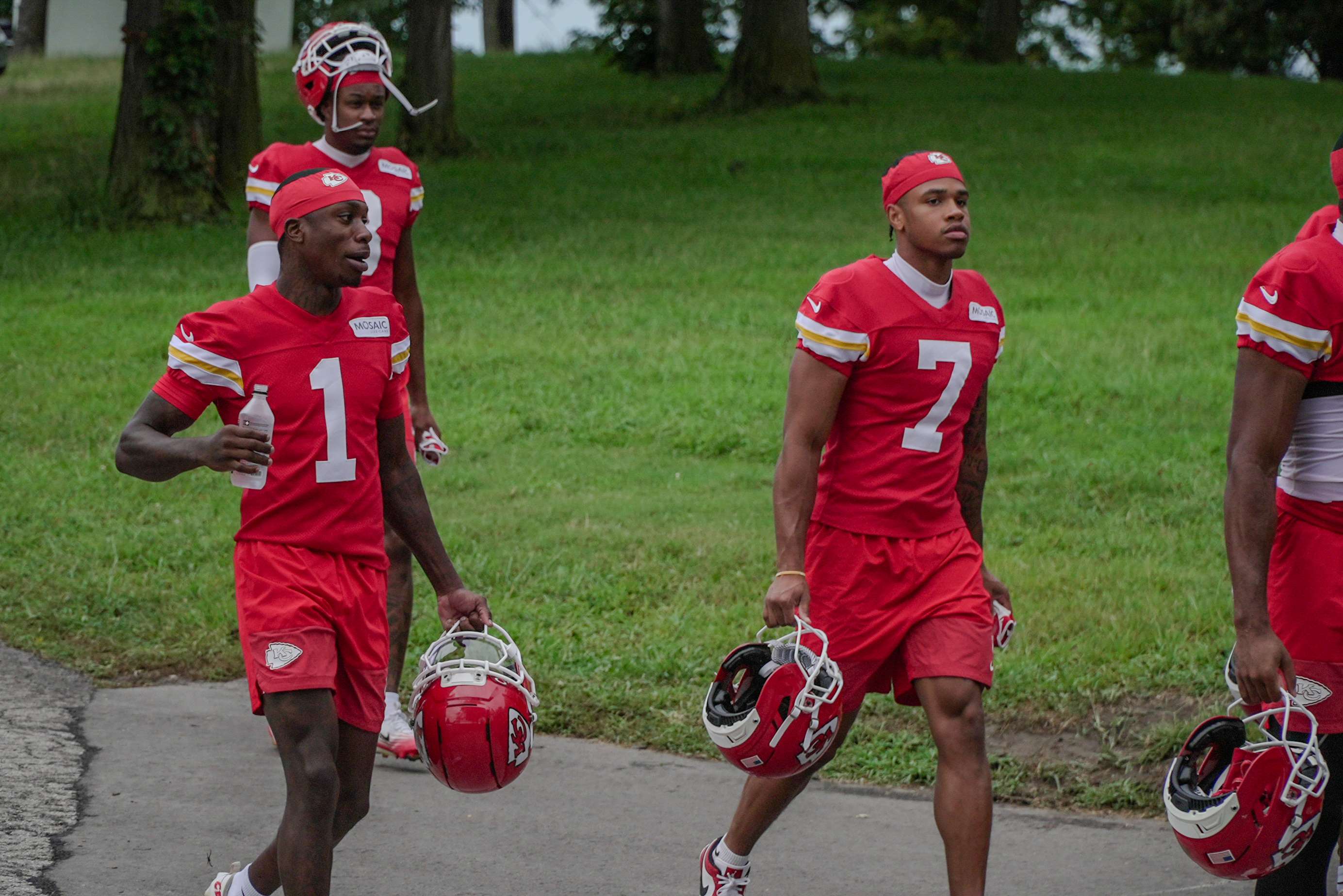 Xavier Worthy (1) and undrafted free agent wide receiver Omari Evans (7) walk down the hill to practice during Chiefs Training Camp/ Photo by Justin Peacock