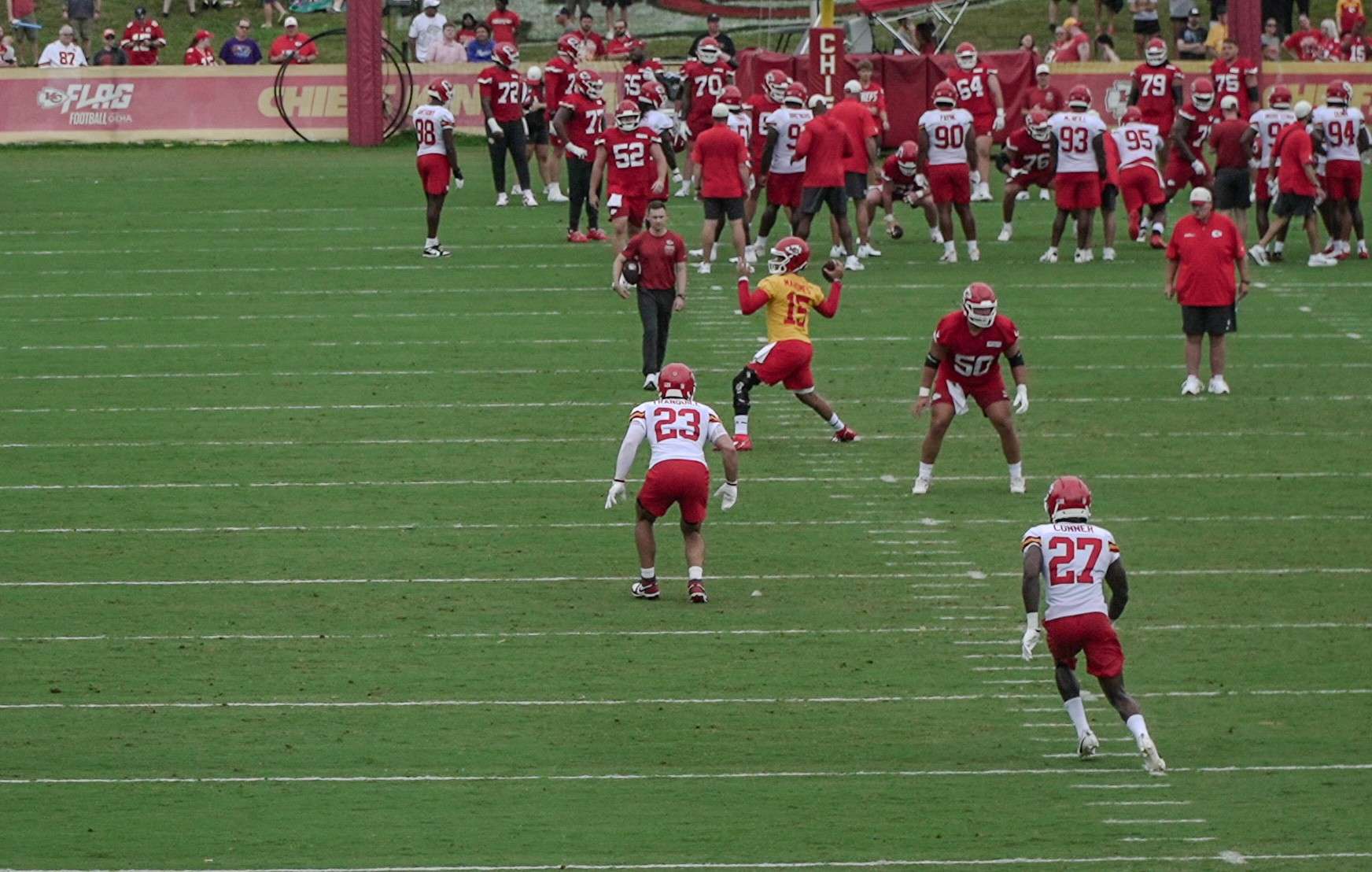 Drue Tranquill (23) and Chamarri Conner (27) drop into coverage as Patrick Mahomes throws a pass during 7-on-7 drills at Chiefs Training Camp/ Photo by Justin Peacock