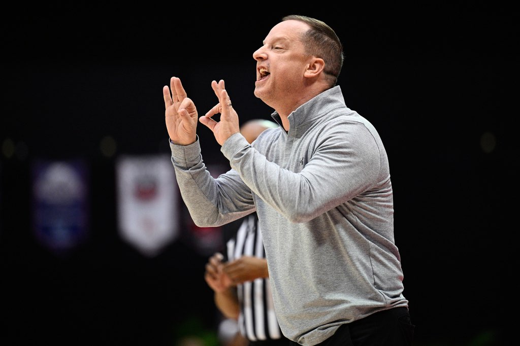 Wichita State head coach Paul Mills calls out instructions against Florida during the first half of an NCAA college basketball game, Nov. 29, 2024, in Kissimmee, Fla. (AP Photo/Phelan M. Ebenhack)
